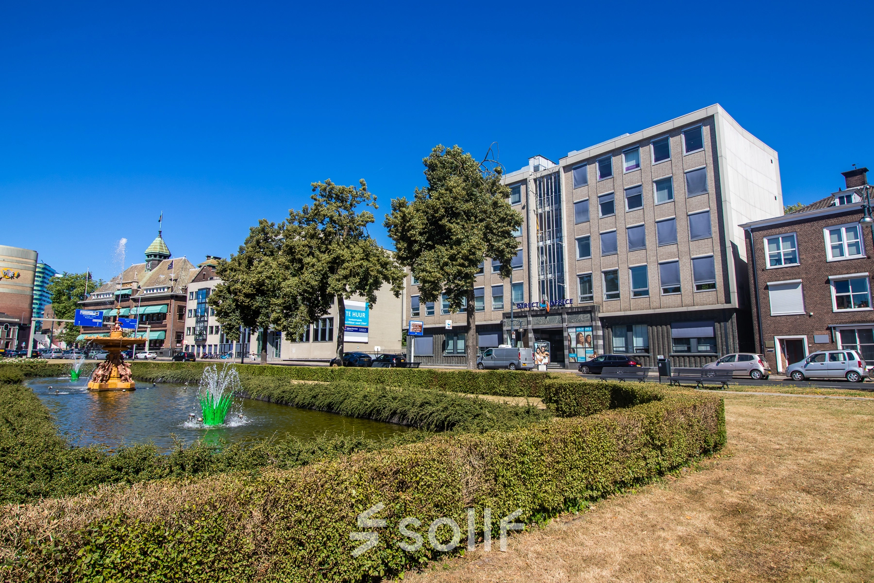 Exterior view of a commercial building at Jansbuitensingel 7, a prime location for office to rent in Arnhem Centrum.