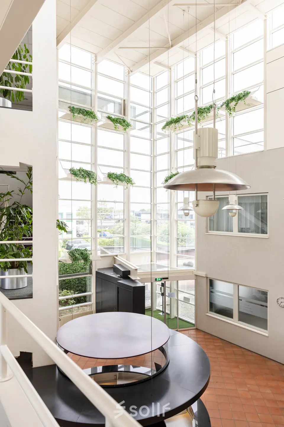 Bright office space with large windows and ample natural light at Vlamoven 34, Arnhem IJsseloord, ideal for office space rental.