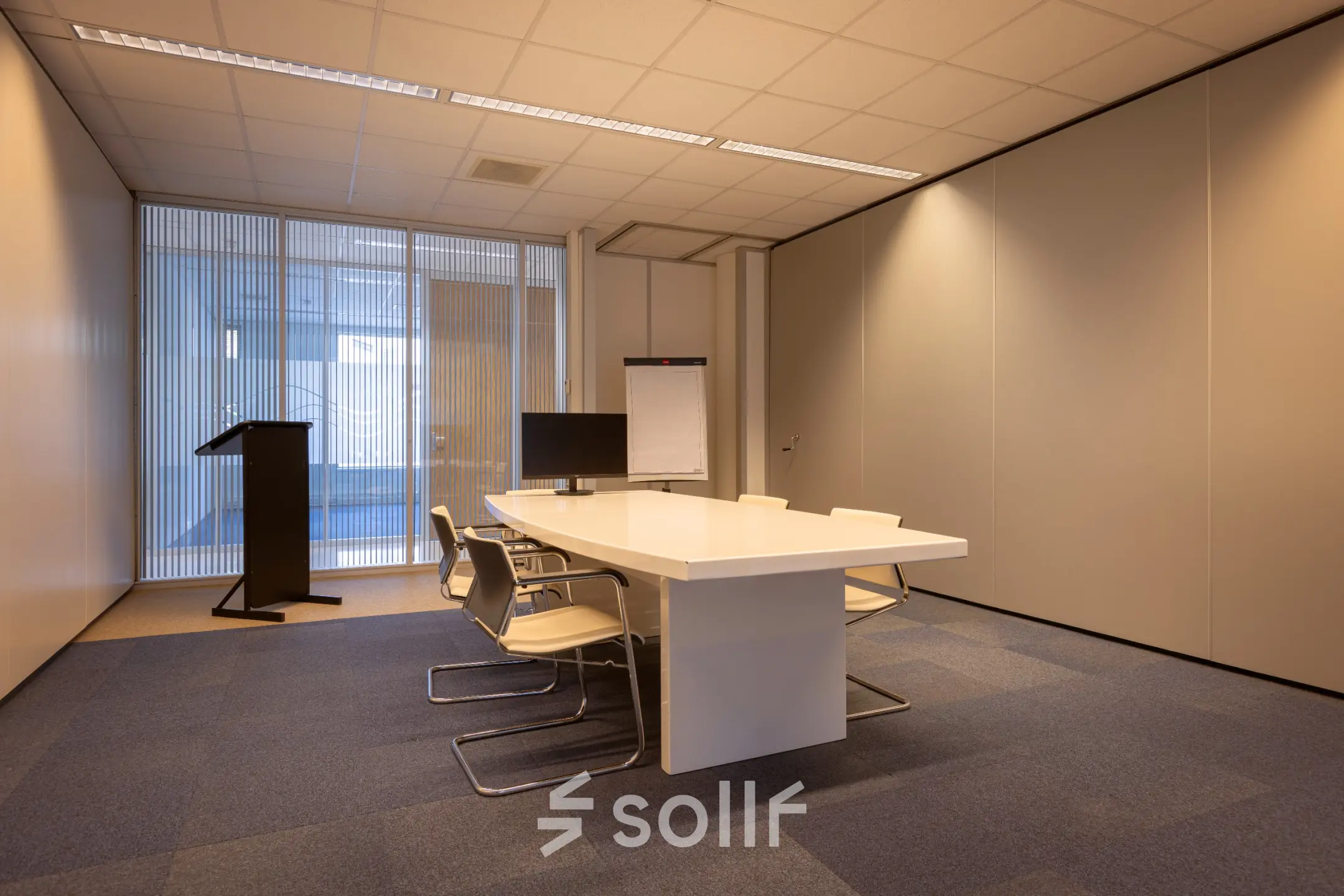 Furnished office space with a meeting table and chairs at Amalialaan 126, ideal for office space rental.