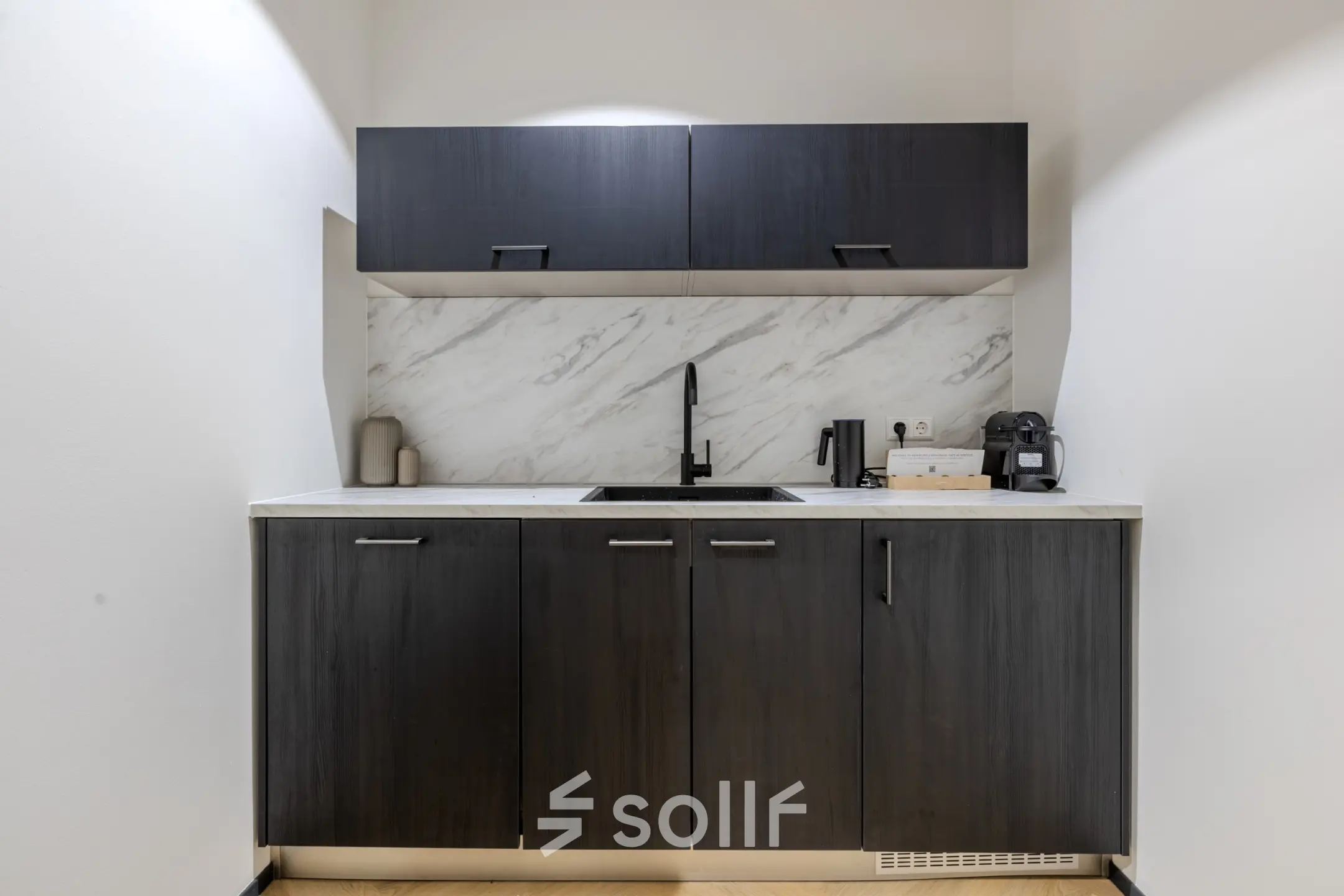 A compact, stylish pantry area in an office at Rijtuigweg 10, Bergen op Zoom, available for office space rental.