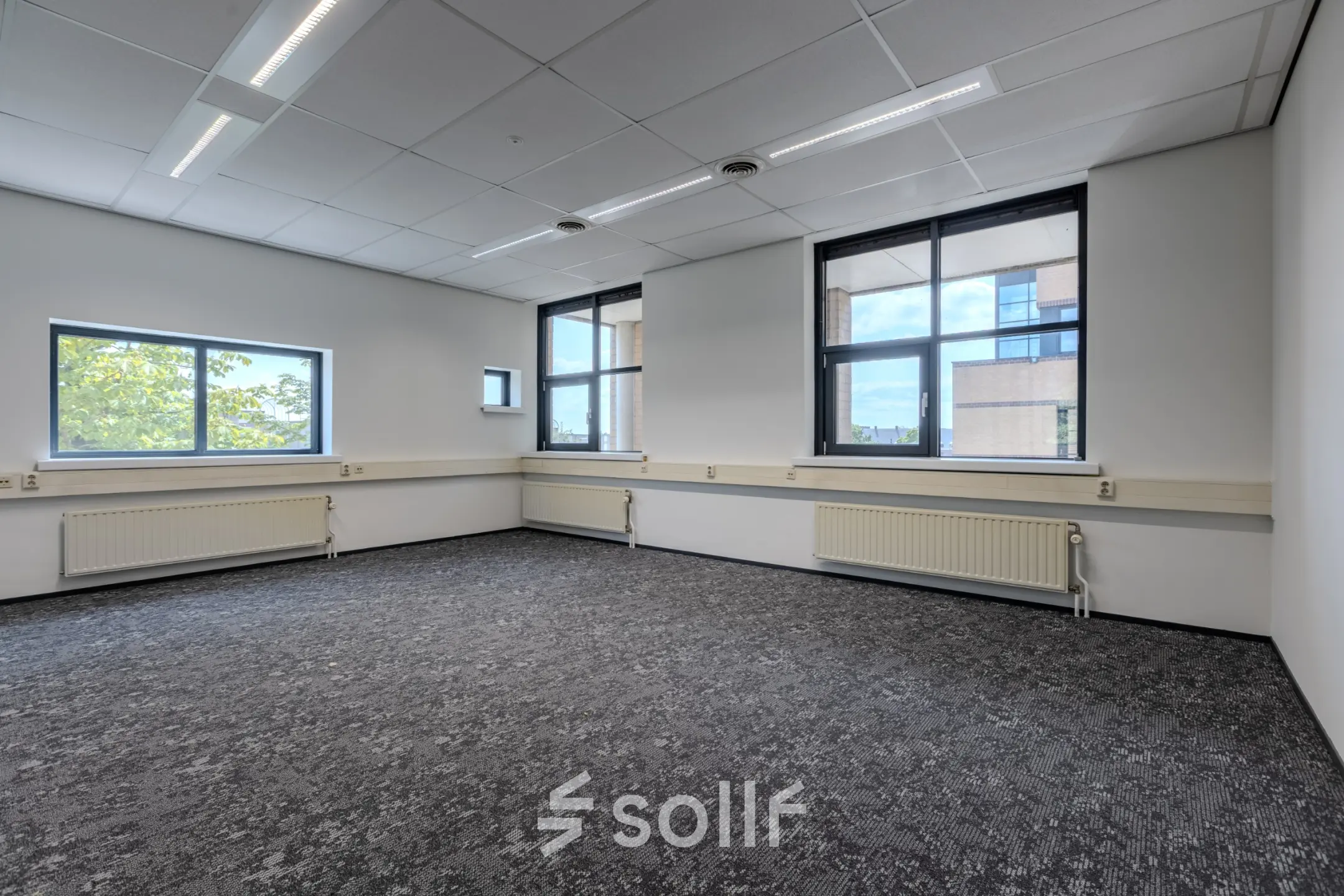 Bright office space at Rijtuigweg 10, Bergen op Zoom, perfect for office space rental with large windows letting in natural light.