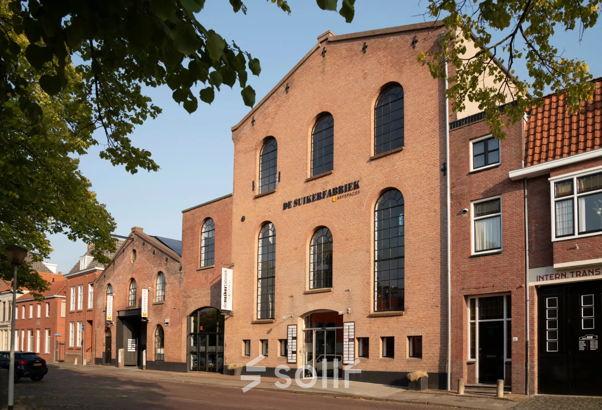 Exterior view of office space available for rent at Zuidzijde Haven 39a, Bergen op Zoom, featuring a classic brick facade.