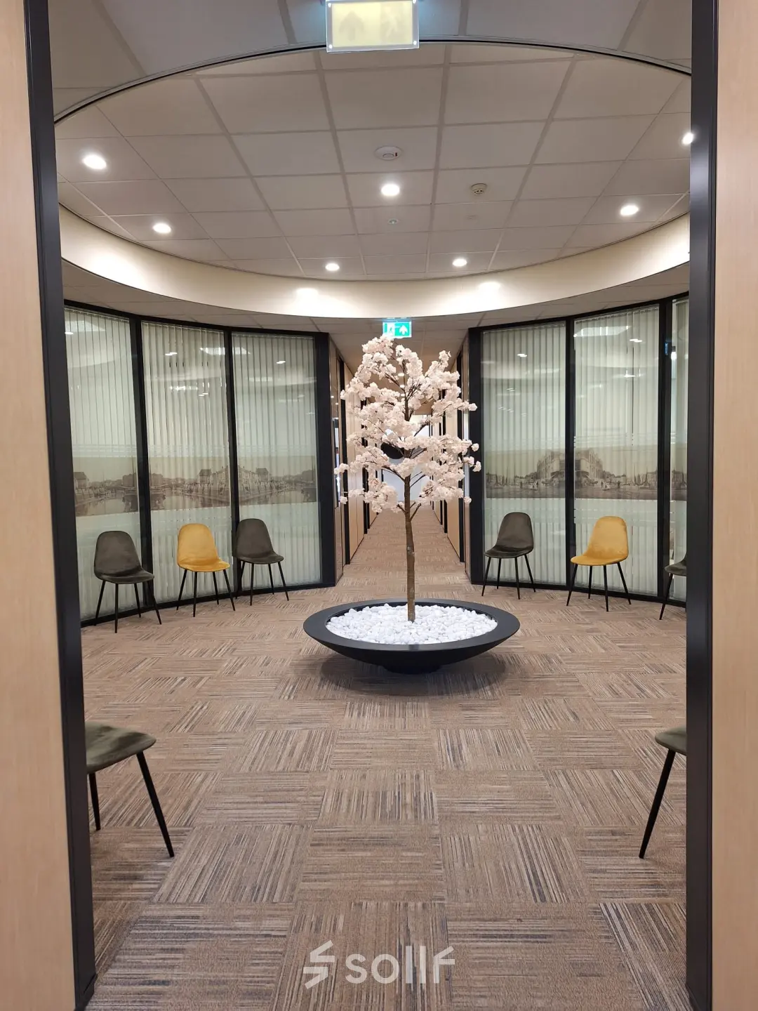 Office to rent at Zuidzijde Haven 39a, Bergen op Zoom featuring a stylish interior with modern seating around a decorative centerpiece.