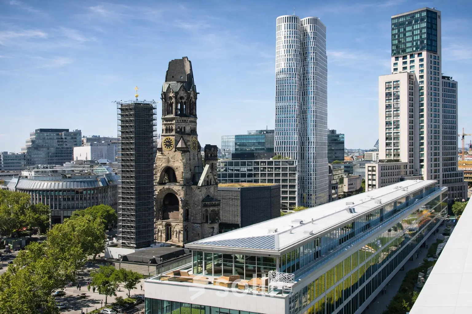 View from Kurfürstendamm 11 in Berlin Charlottenburg showing the surrounding cityscape and prominent buildings.