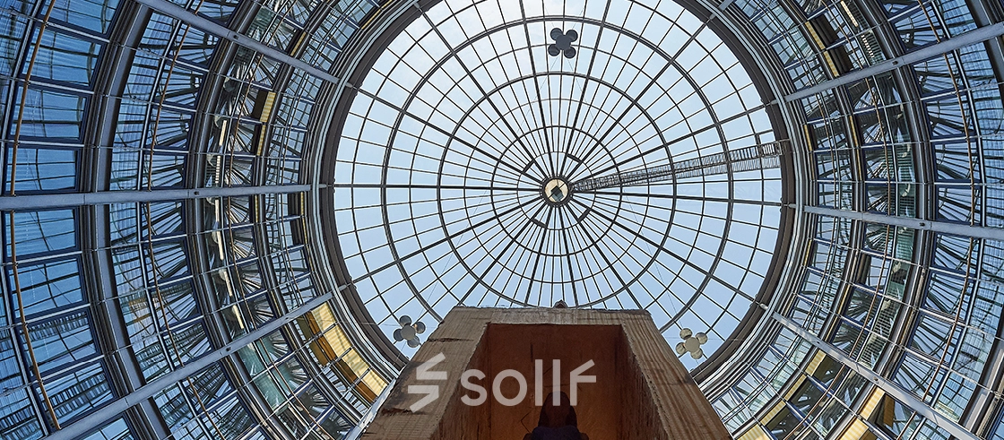 Glass-domed ceiling at Koppenstraße 93, Berlin Friedrichshain, offering a unique office space rental atmosphere with abundant natural light.
