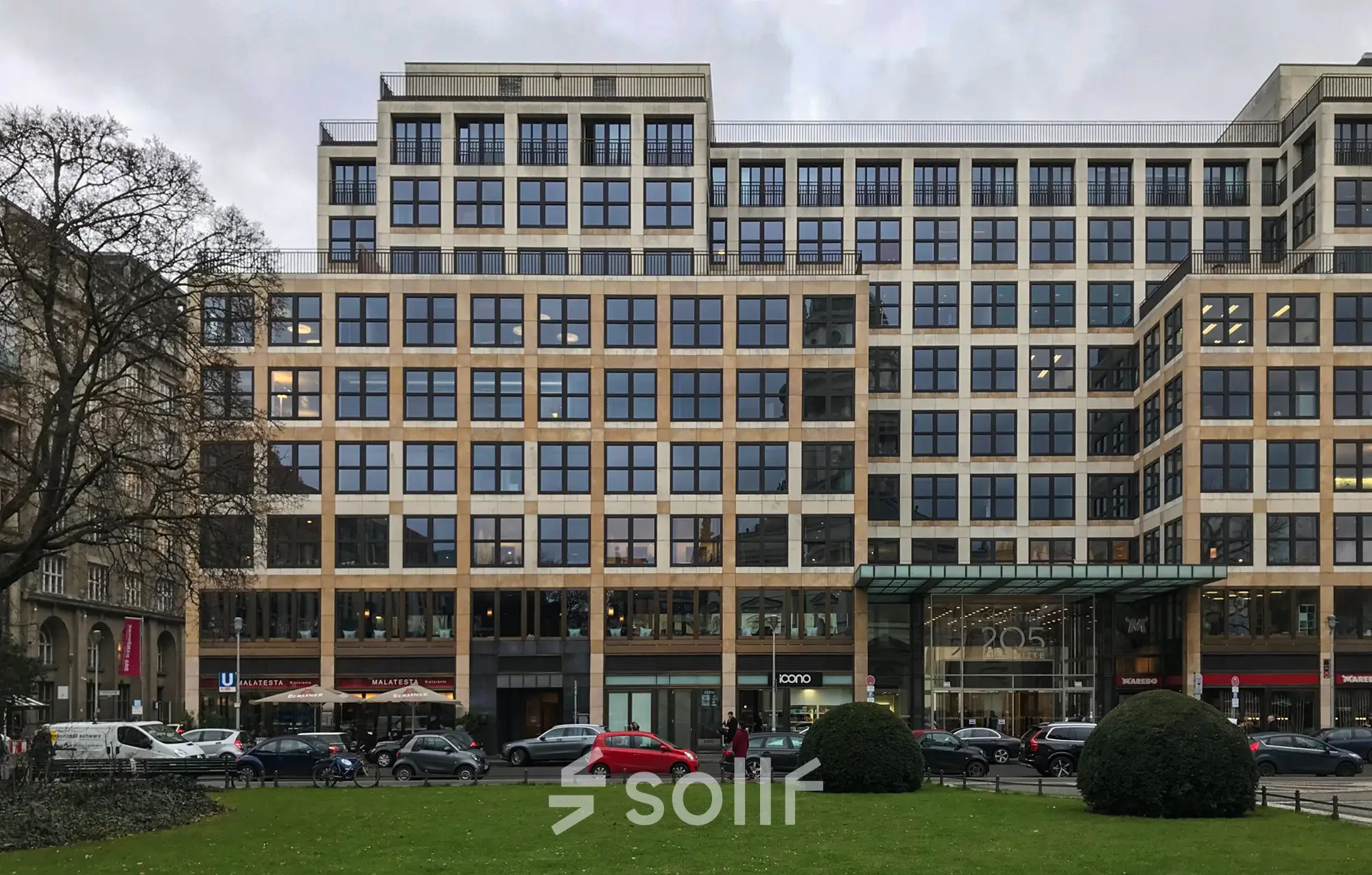 Exterior view of office building at Friedrichstraße 68, a prime location for office space rental in Berlin Mitte.