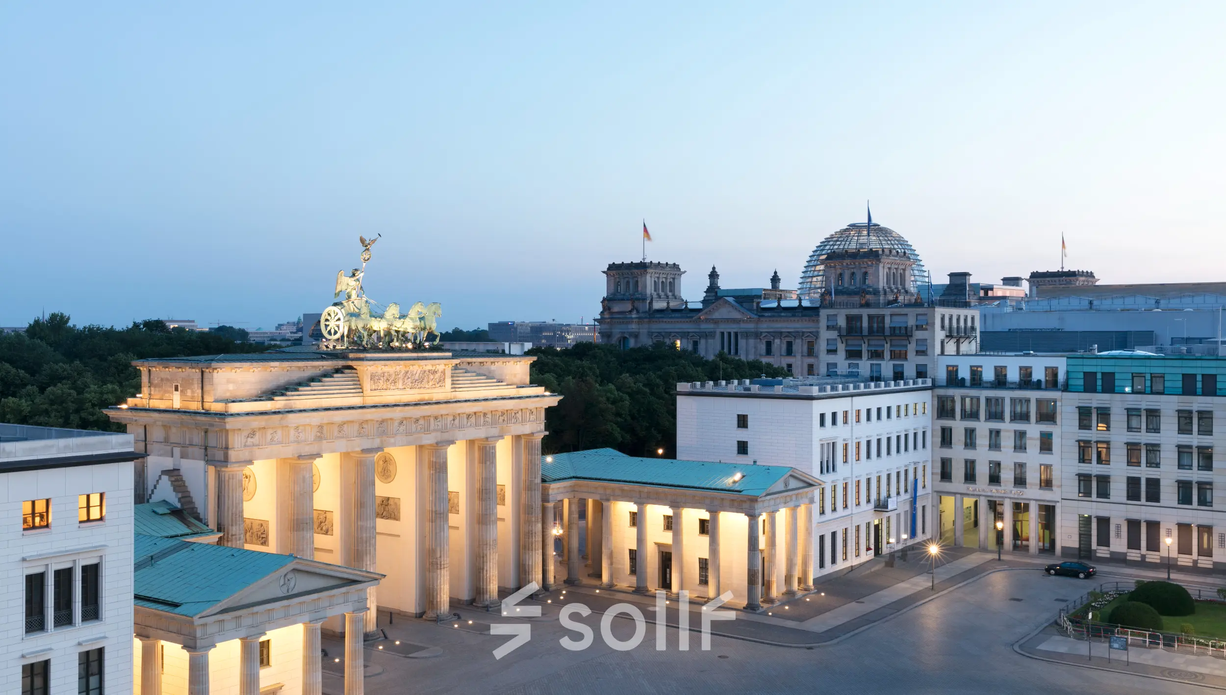 Exterior view of Pariser Platz 6a, Berlin Mitte, near the iconic Brandenburg Gate, offering office space rental with a historic backdrop.