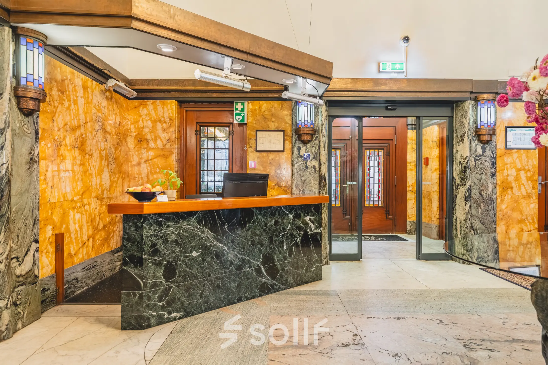 Interior view of a stylish office space rental at Ceresstraat 13, Breda Centrum-Station, featuring a welcoming reception desk with a modern design.