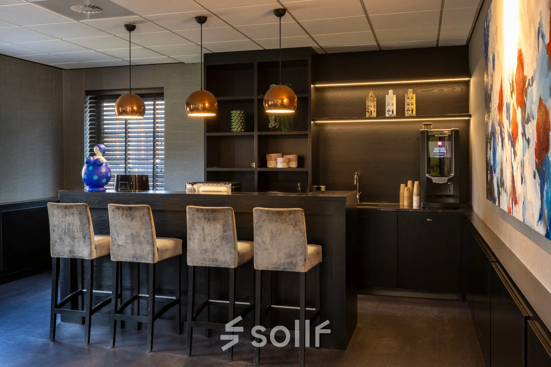 Furnished office space with a modern bar setup at Takkebijster 57A, Breda Oost-Brabantpark, available for rent.