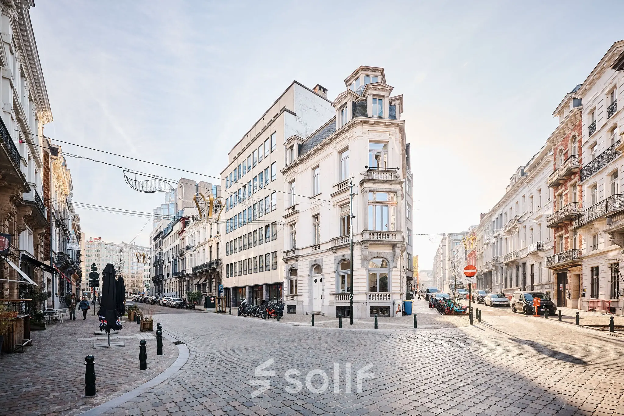 Street view of Rue du Congres 37 in Brussels Center, showcasing traditional architecture ideal for office space rental.