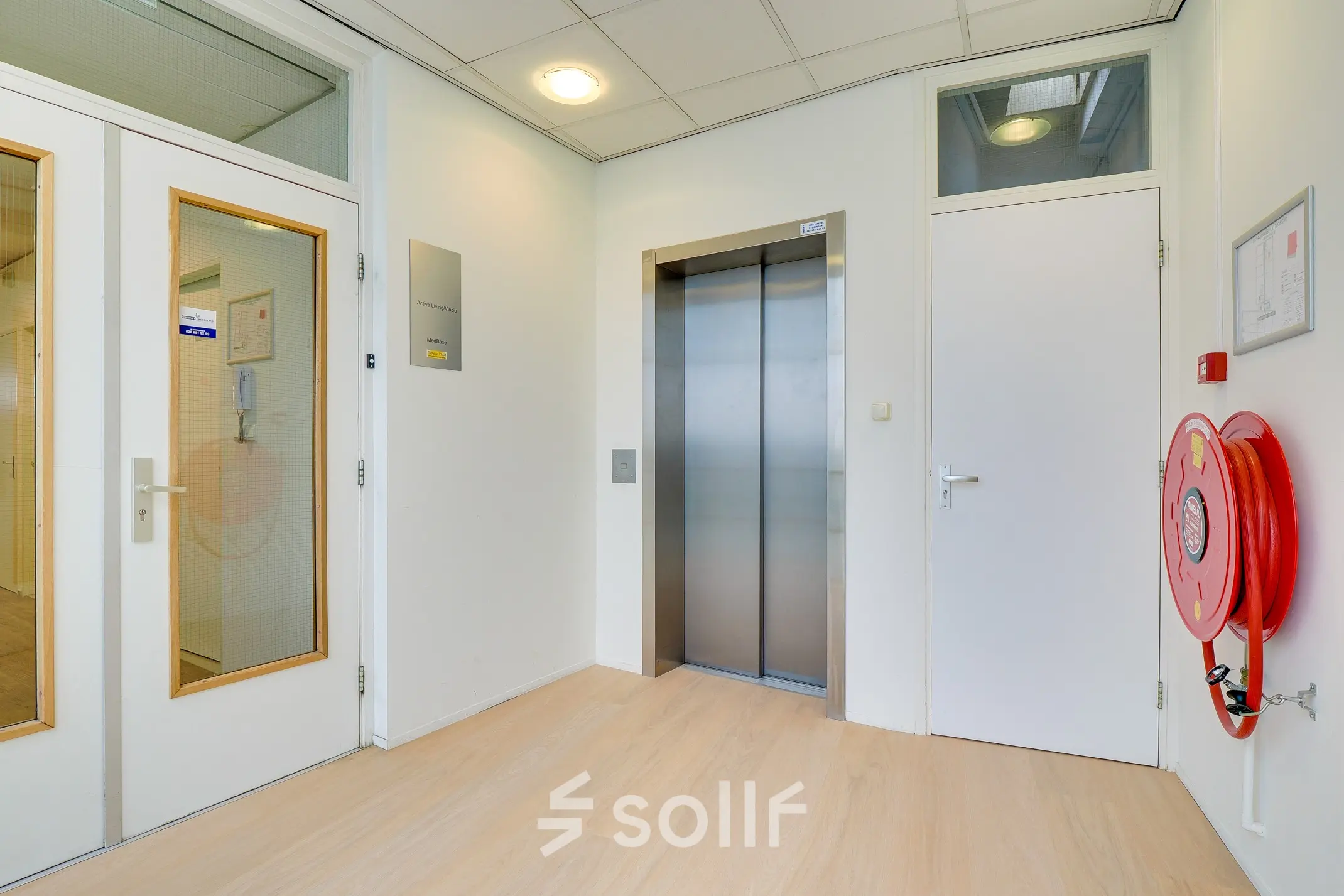 Elevator area inside office space at Regulierenring 2, Bunnik, available for rent.