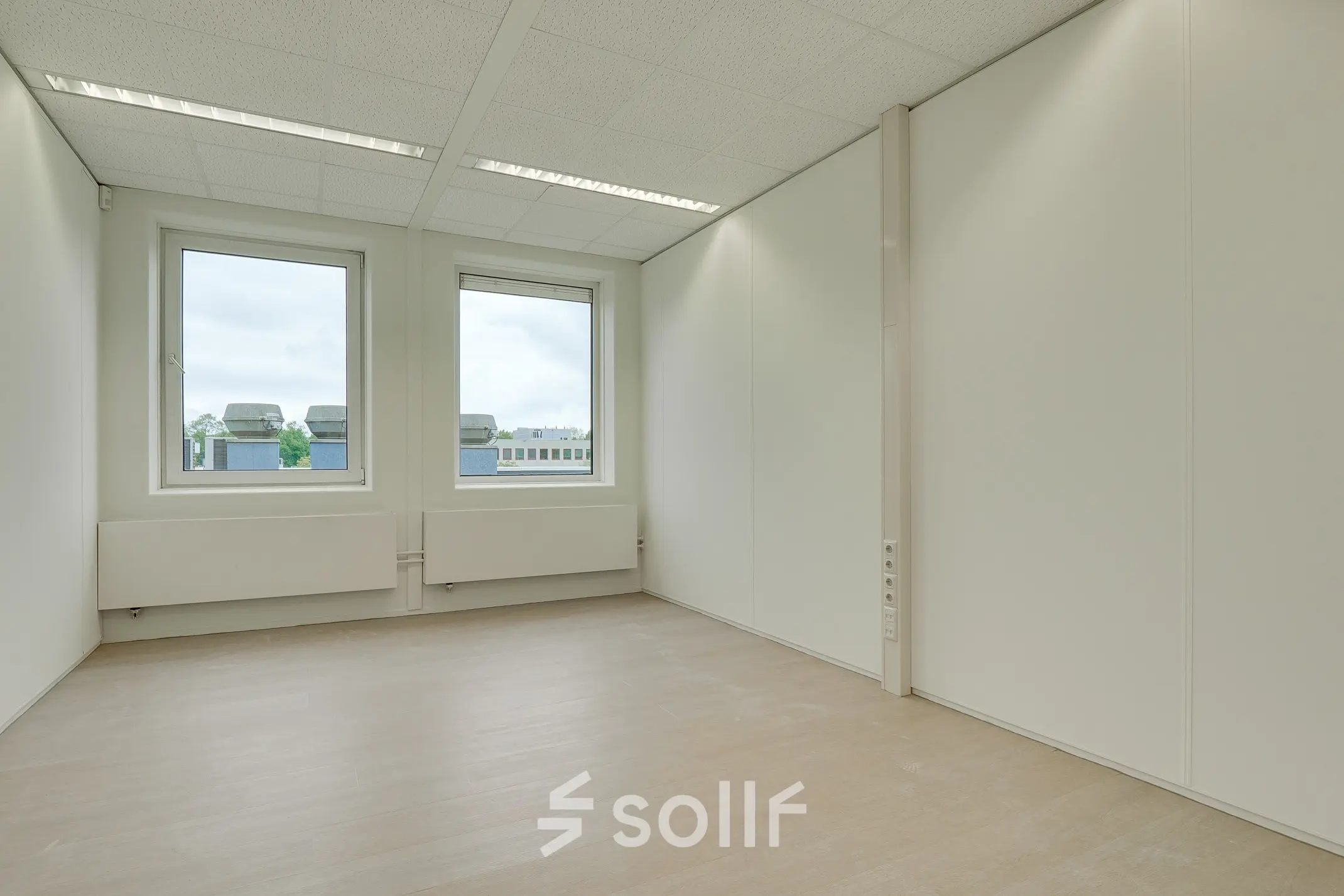 Unfurnished office space with large windows at Regulierenring 2, Bunnik, ideal for rent office space.