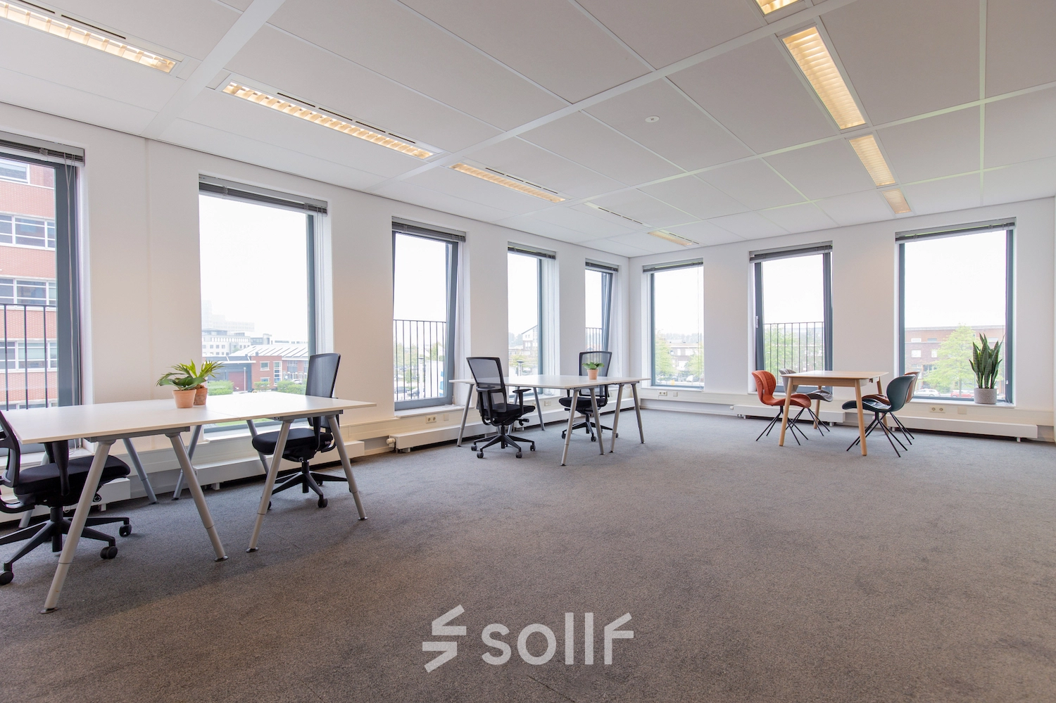 Bright office space with large windows and modern furnishings available for rent at Fascinatio Boulevard 562, Capelle aan den IJssel.