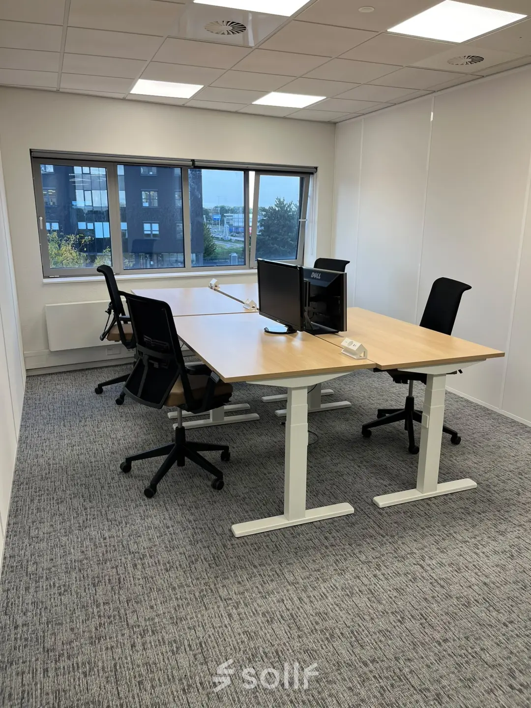 Furnished office space with desks and swivel chairs at Rivium Quadrant 75, ideal for business activities.