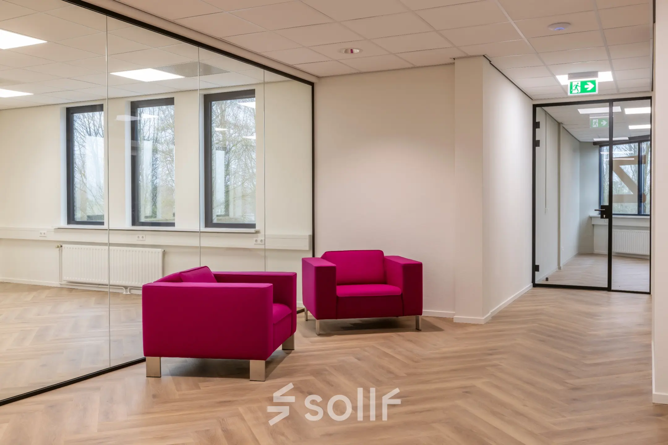 Modern furnished office space with vibrant purple chairs and glass walls at Vlierbaan 20, perfect for rent office space in Capelle aan den IJssel.