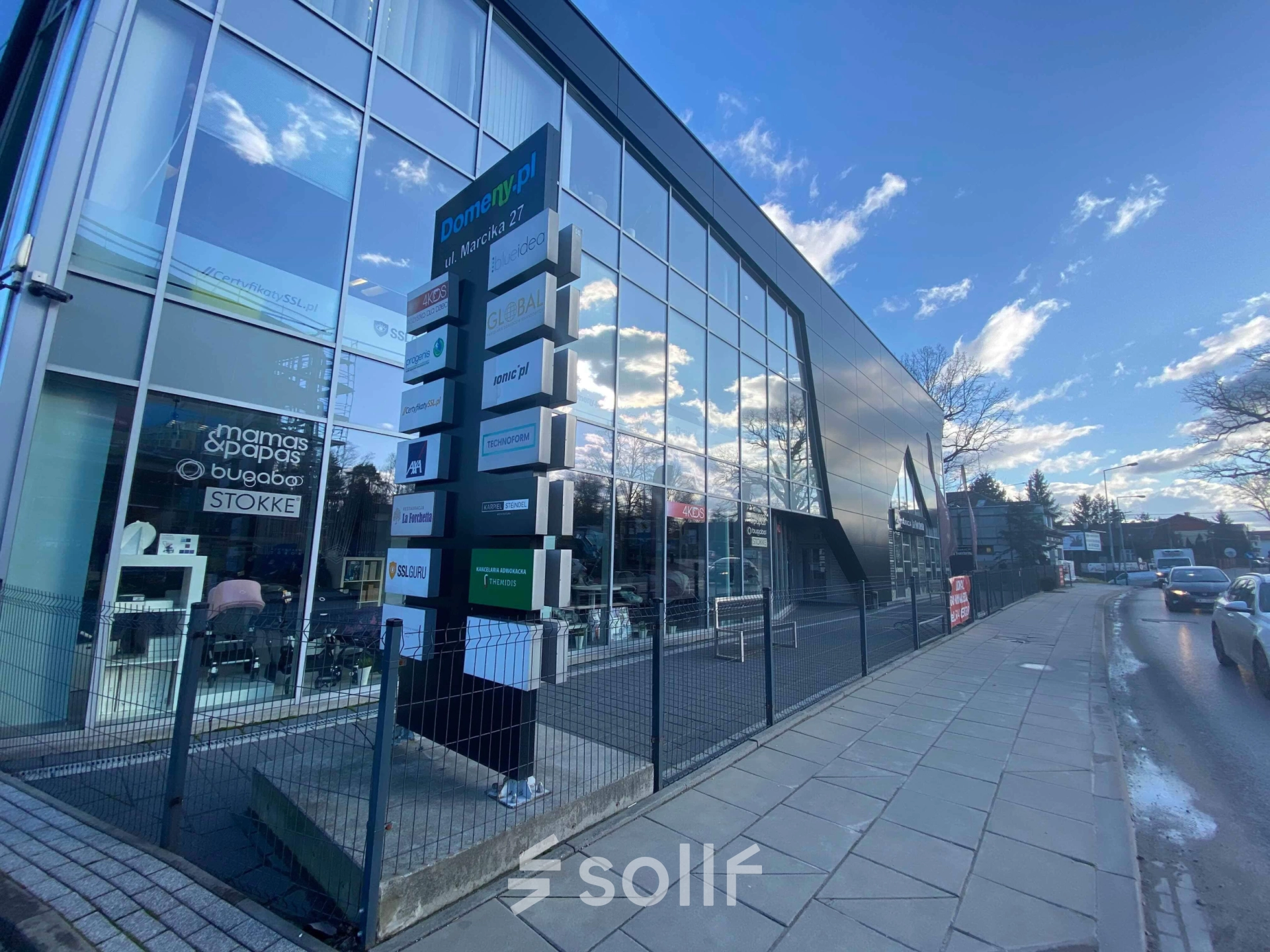 Exterior view of the Marcika 27 office building in Cracow Łagiewniki Borek Fałęcki, showcasing a sleek modern design perfect for office space rental.