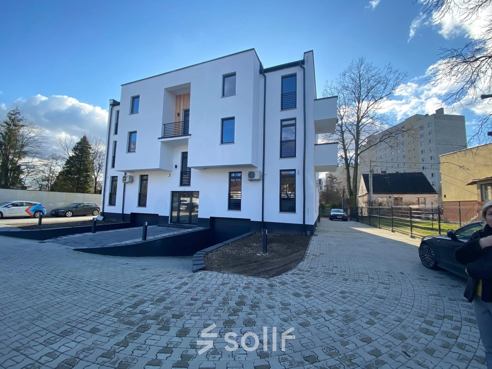 Exterior view of the office building at Jastrzębia 24, Cracow Podgorze Duchackie, showcasing a modern facade, ideal for office space rental.