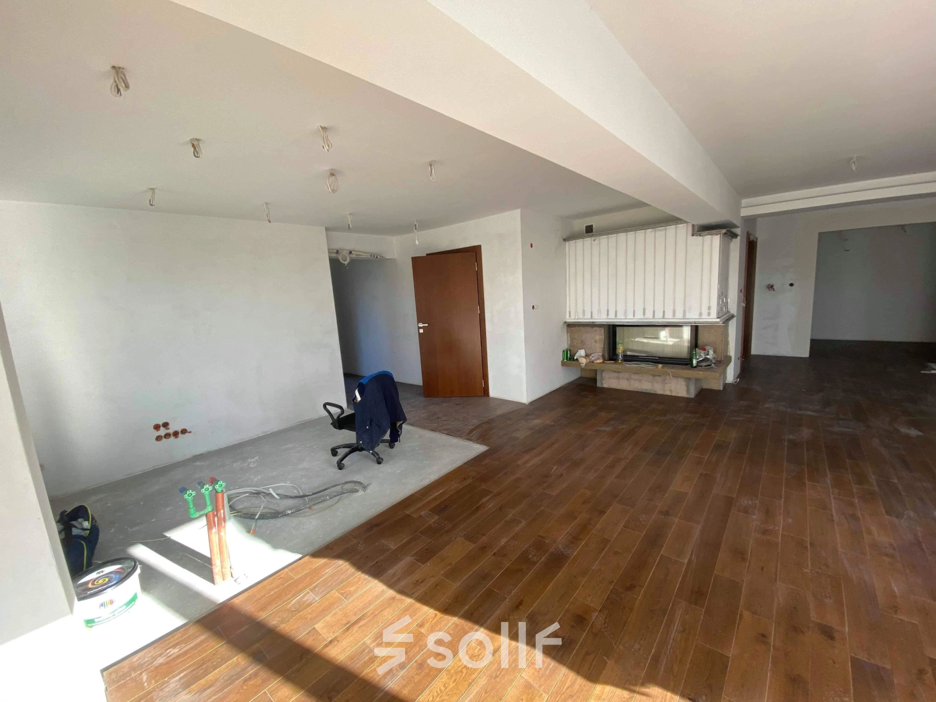 Unfurnished office interior at Jastrzębia 24 in Cracow Podgorze Duchackie, featuring wooden floors and a large open space, ideal for office space rental opportunities.