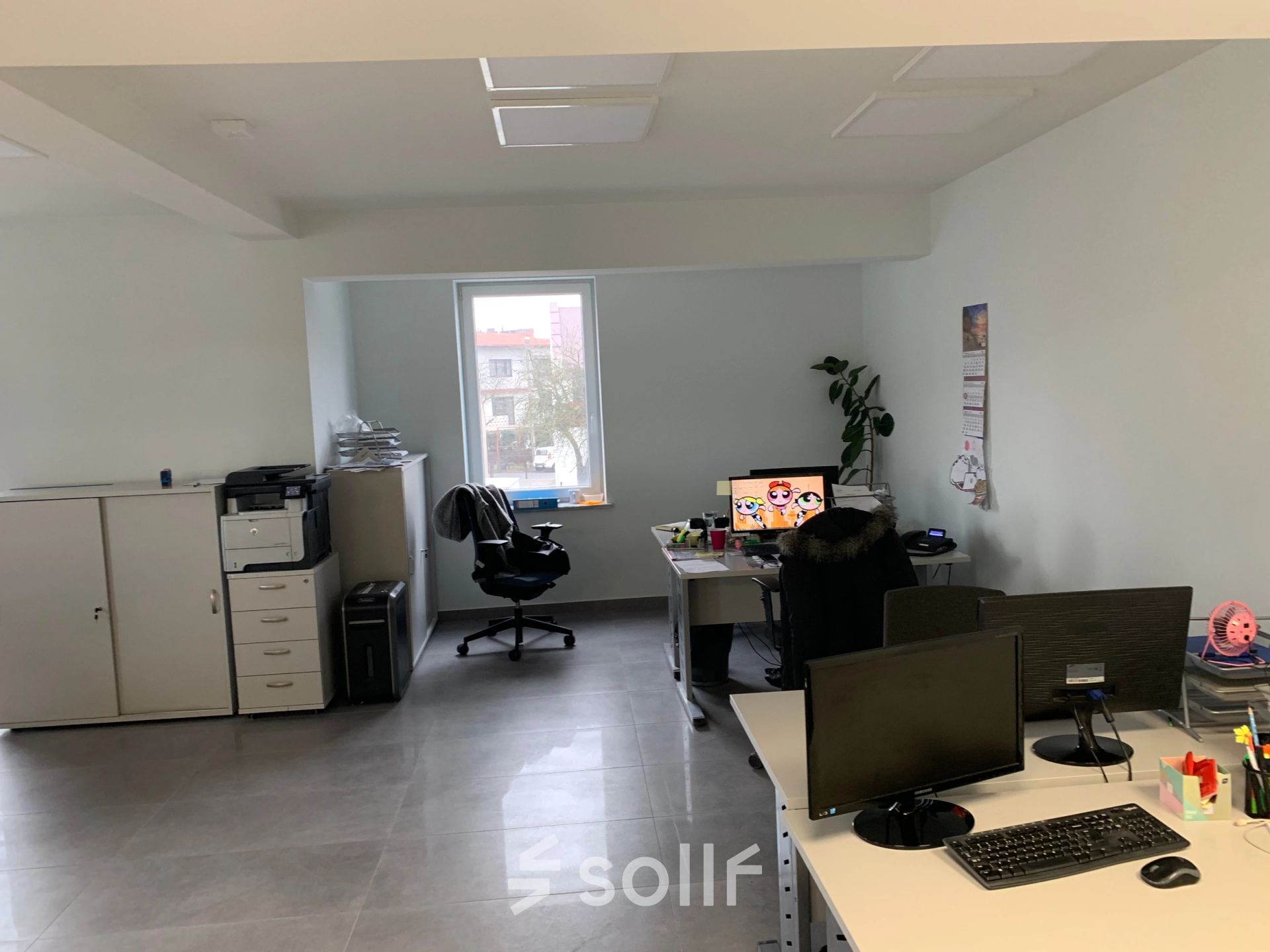 A furnished office space for rent at Jastrzębia 24, Cracow Podgorze Duchackie, featuring desks, chairs, monitors, and an inviting workspace atmosphere.