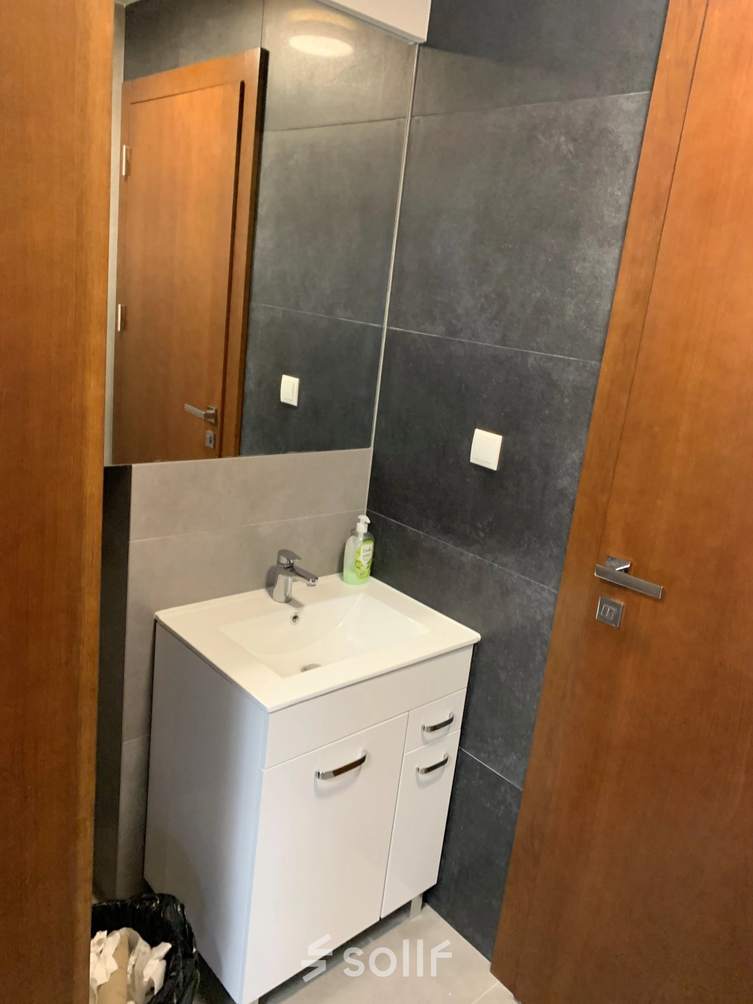 Modern and functional restroom in an office space rental at Jastrzębia 24, Cracow Podgorze Duchackie, featuring a sleek sink and contemporary design.