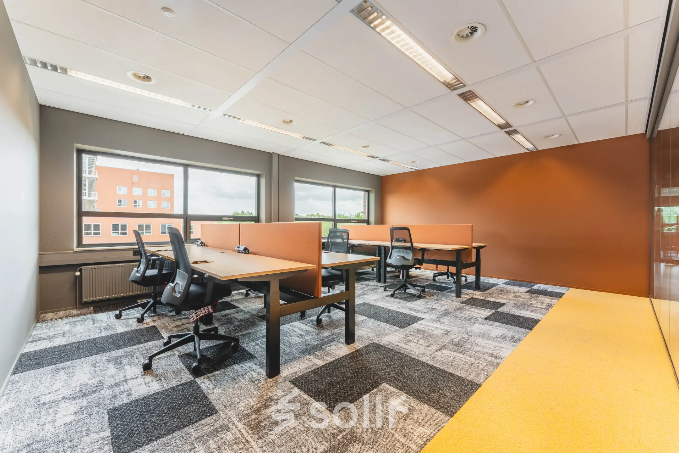 Bright office at Rijnzathe 12, De Meern, with a modern open floor plan featuring desks and chairs available for office space rental.