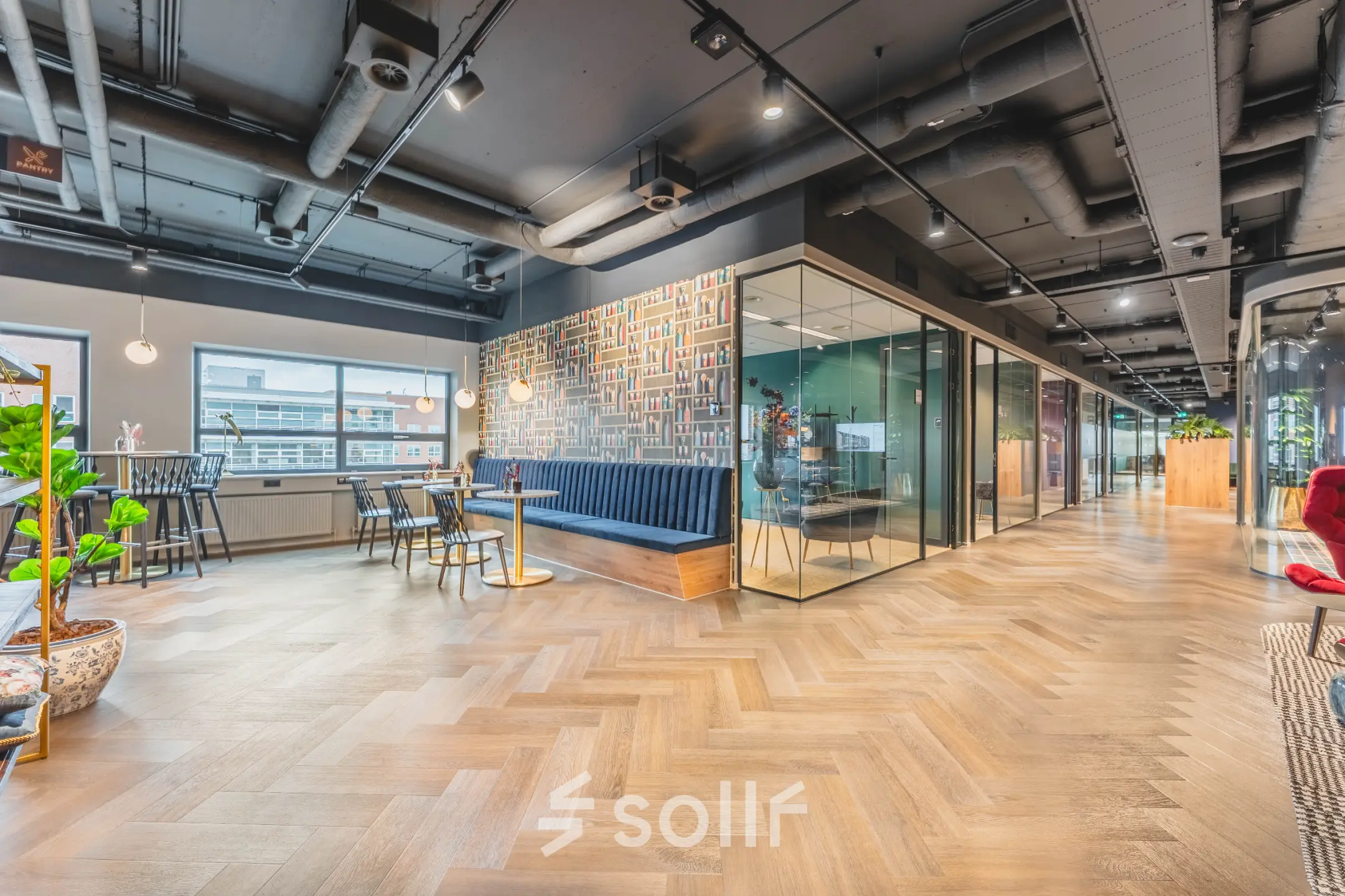 Modern office space to rent at Rijnzathe 12, De Meern, featuring stylish furnishings with an open floorplan perfect for collaboration.