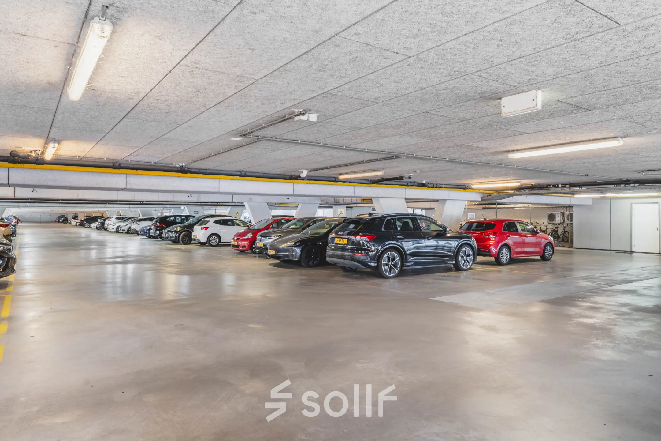 Spacious parking area at Rijnzathe 12, De Meern, ideal for secure office space rental access.