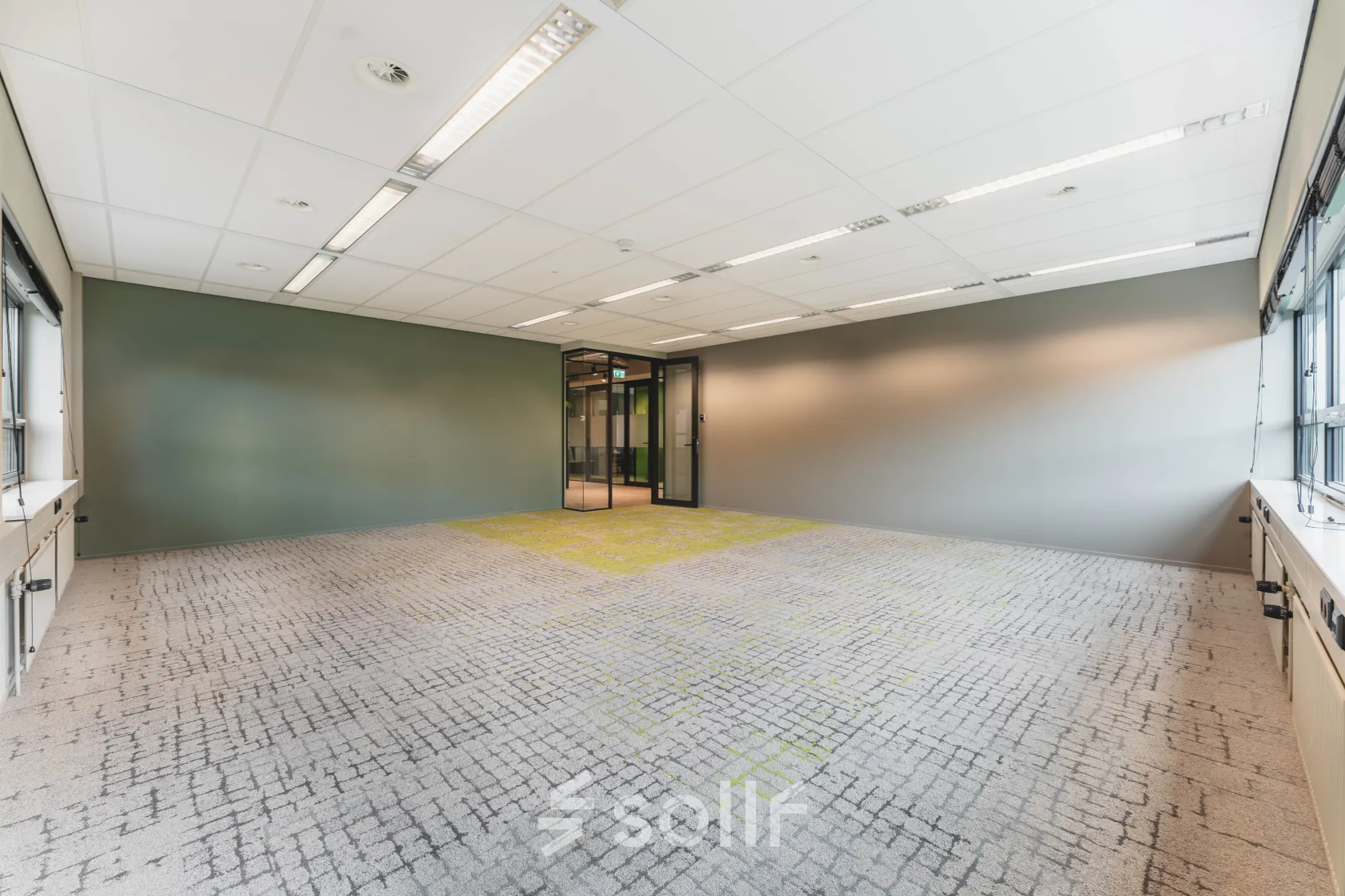 Spacious office at Rijnzathe 12, De Meern, available for rent, featuring large windows and ample lighting, perfect for businesses seeking bright office space rental.