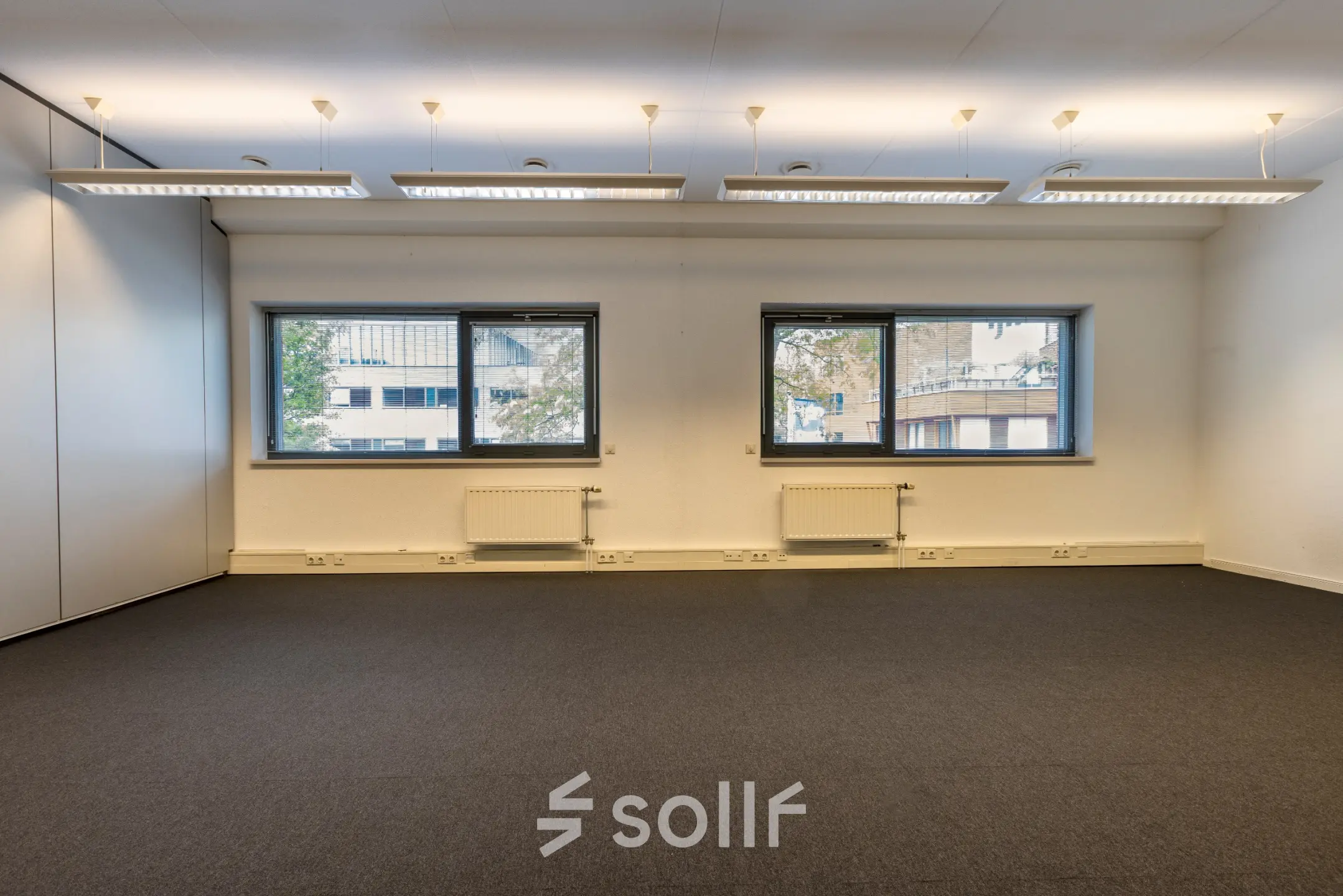 Office space at Delftechpark 9, Delft, featuring large windows and ample natural light, ideal for office space rental.