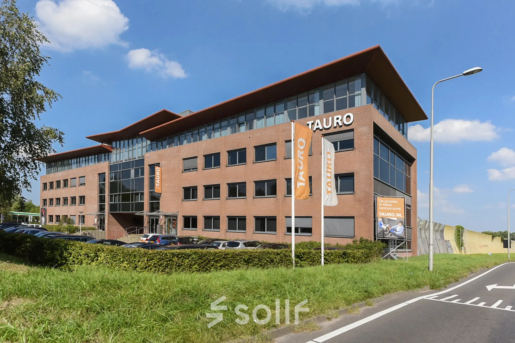 Exterior view of office building at Marshalllaan 2, Delft, showcasing rental office space availability.