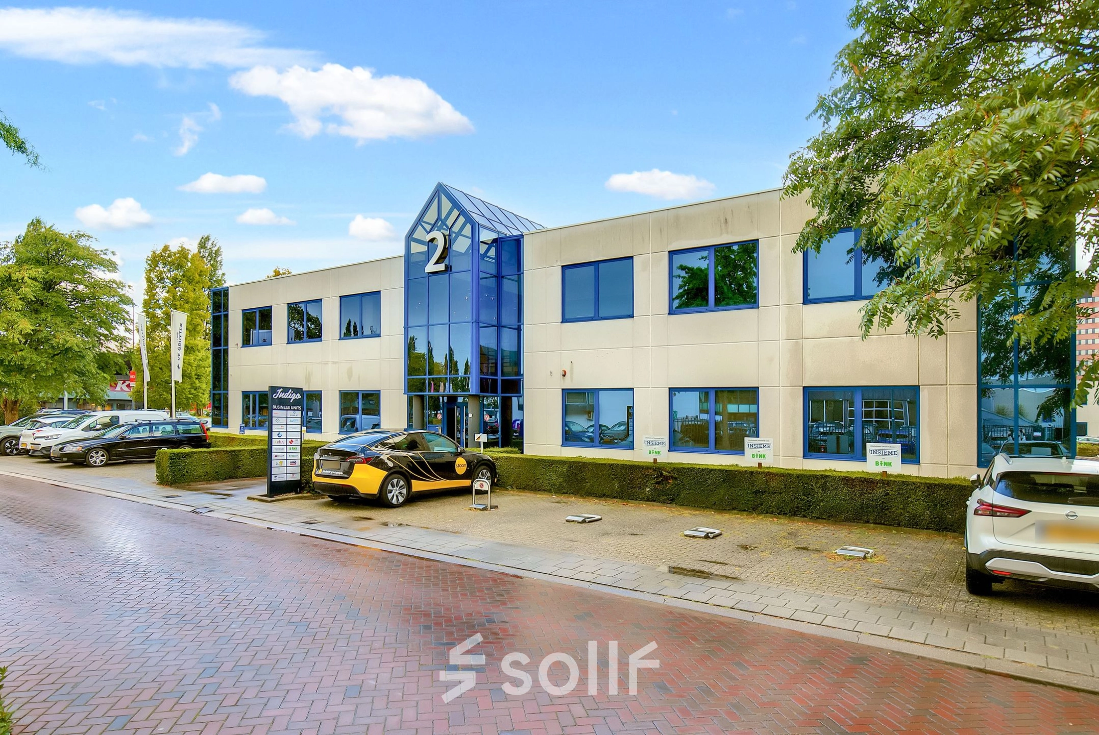Exterior view of an office building located at Europalaan 2, Den Bosch, ideal for rent office space opportunities.