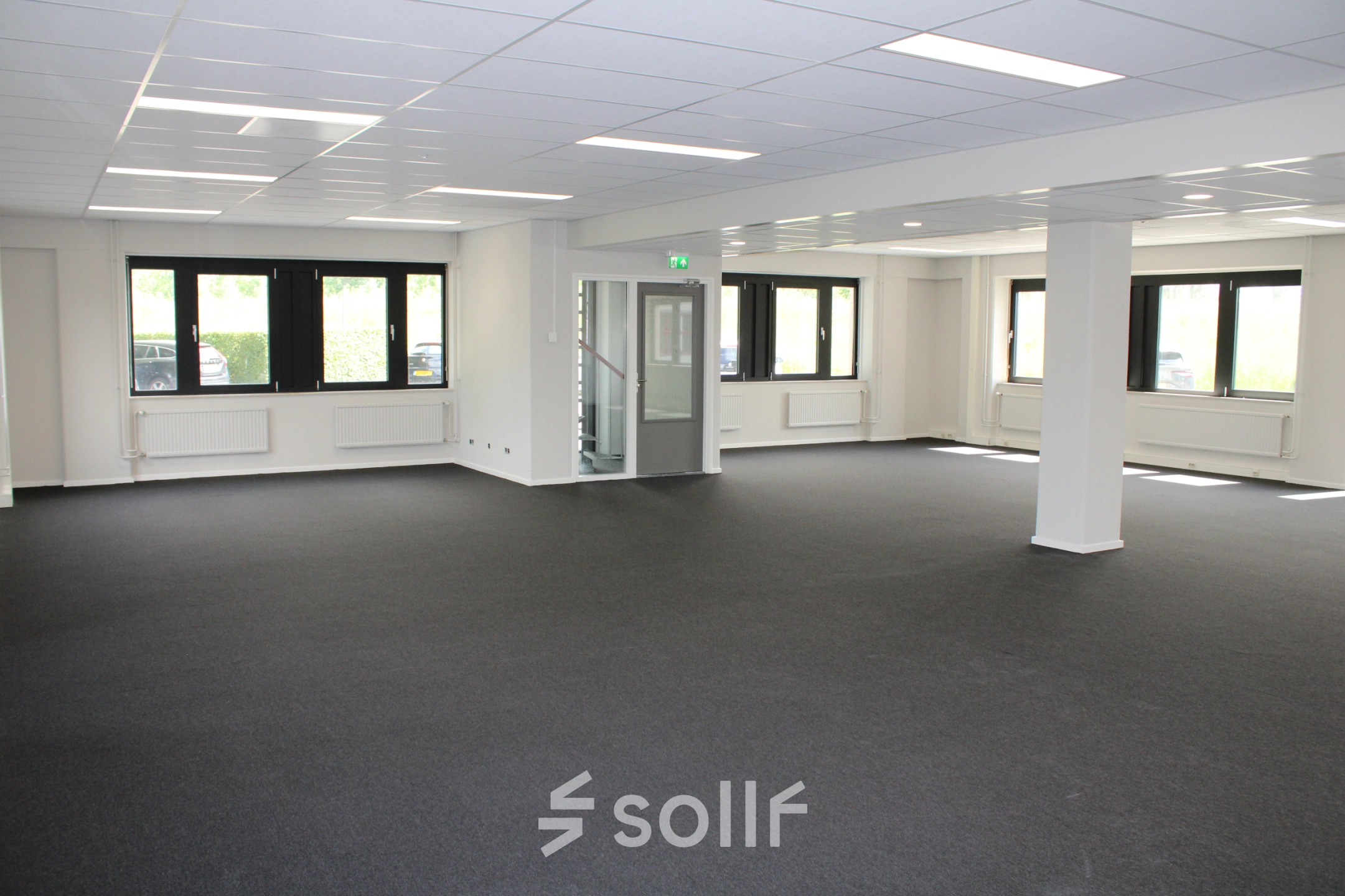 Spacious office space for rent at Keulenstraat 1 in Deventer, featuring large windows and ample natural light. Ideal for businesses seeking an open floor plan for office space rental.