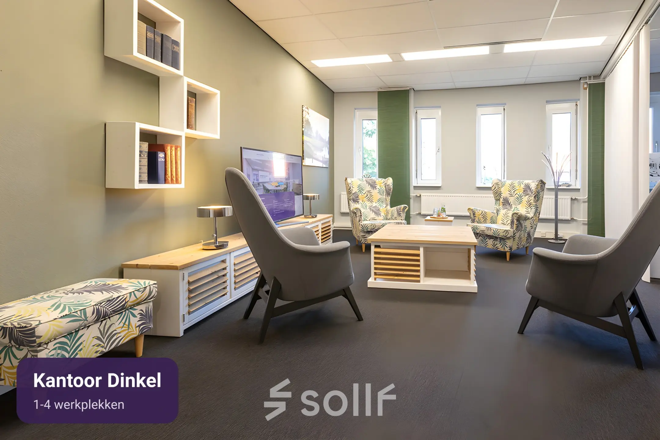 Cozy furnished office space at Keulenstraat 12, Deventer, suitable for rent with comfortable seating and shelving.