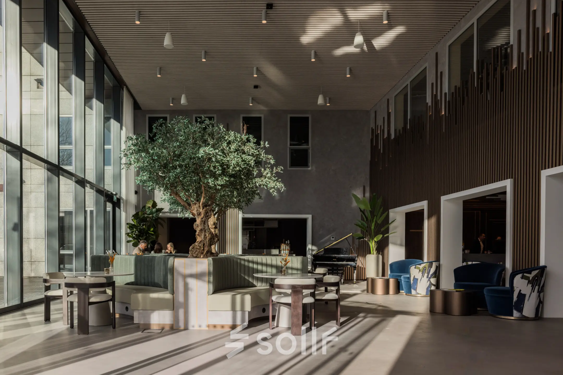 Bright office space at Diemerhof 42, Diemen, with modern furnishings and natural light, perfect for rent as an inviting workspace.