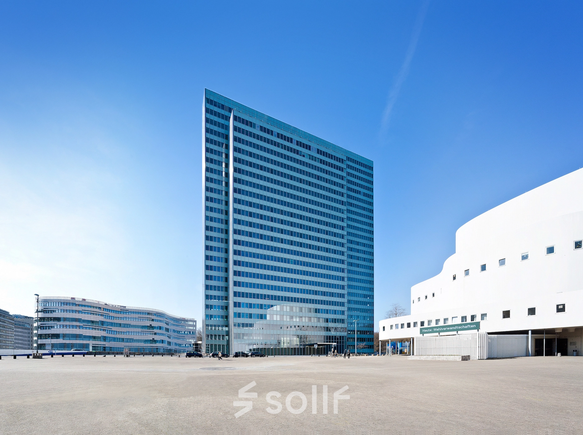 Modern exterior view of Dreischeibenhaus at Düsseldorf Old Town, ideal for office space rental.