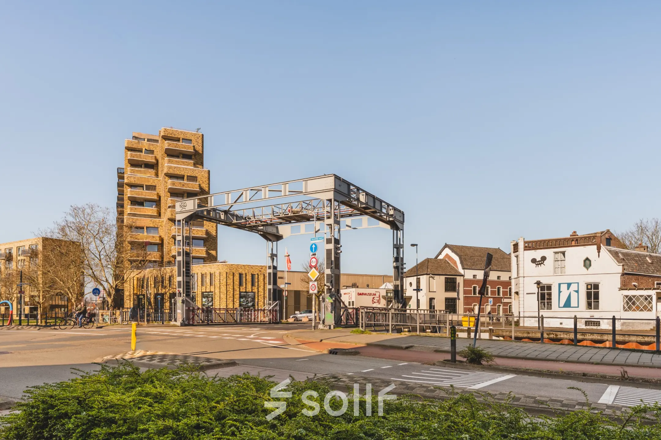 Exterior view of Kanaaldijk-Zuid 19 in Eindhoven Center, showcasing nearby buildings and structure.