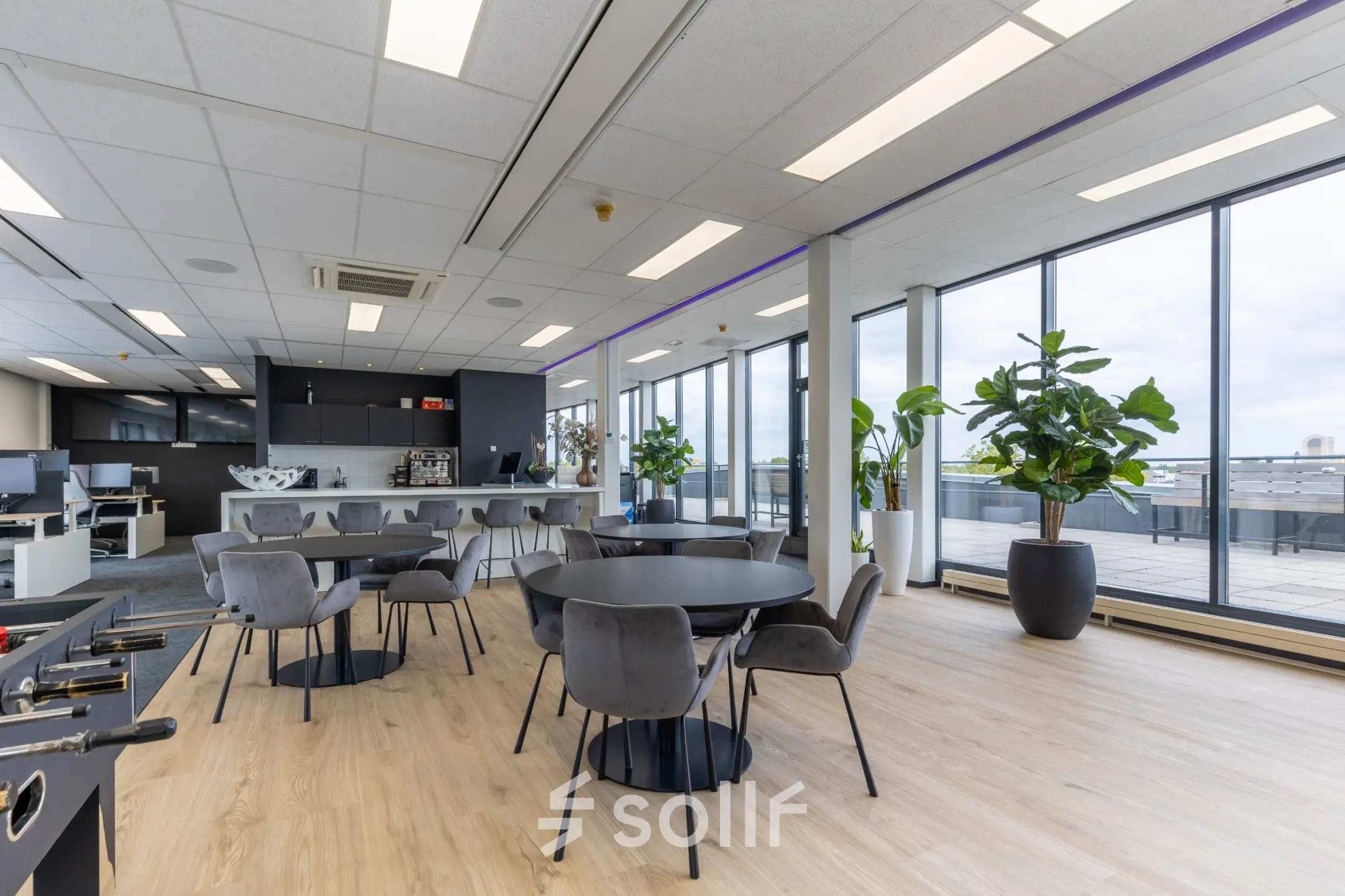 Bright, stylish office space rental at Meerenakkerplein 1-10, Eindhoven De Hurk, featuring modern furniture and large windows for natural light.