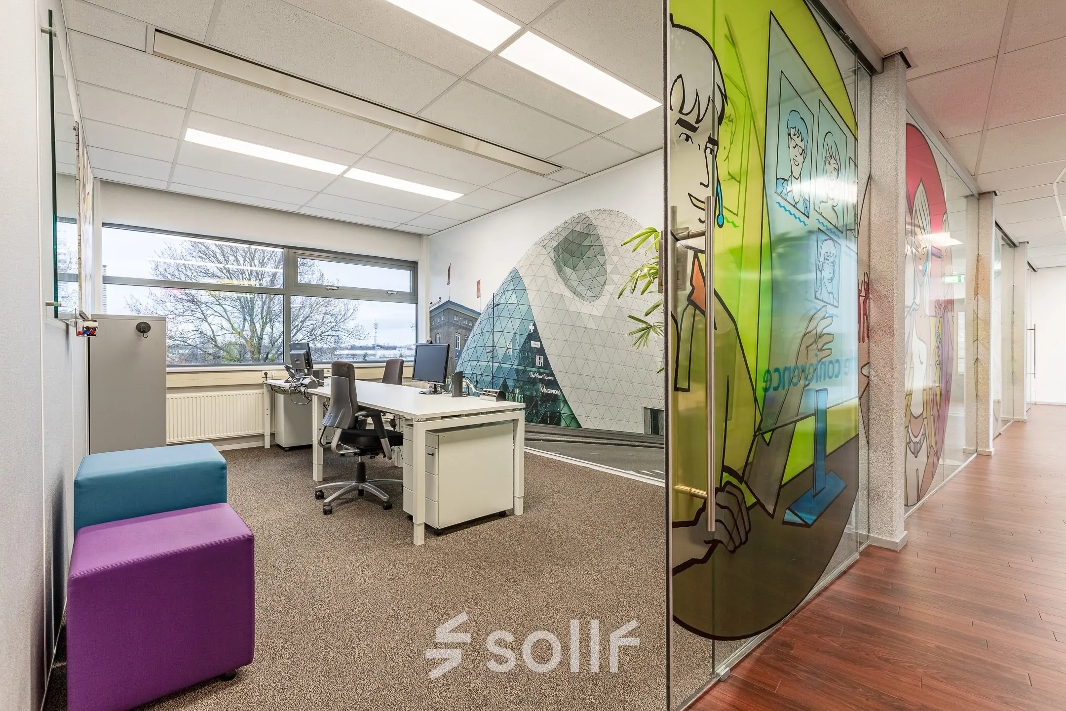 Bright and spacious office at Meerenakkerplein 11-20 in Eindhoven De Hurk, featuring modern decor and large windows. Ideal office space rental opportunity.