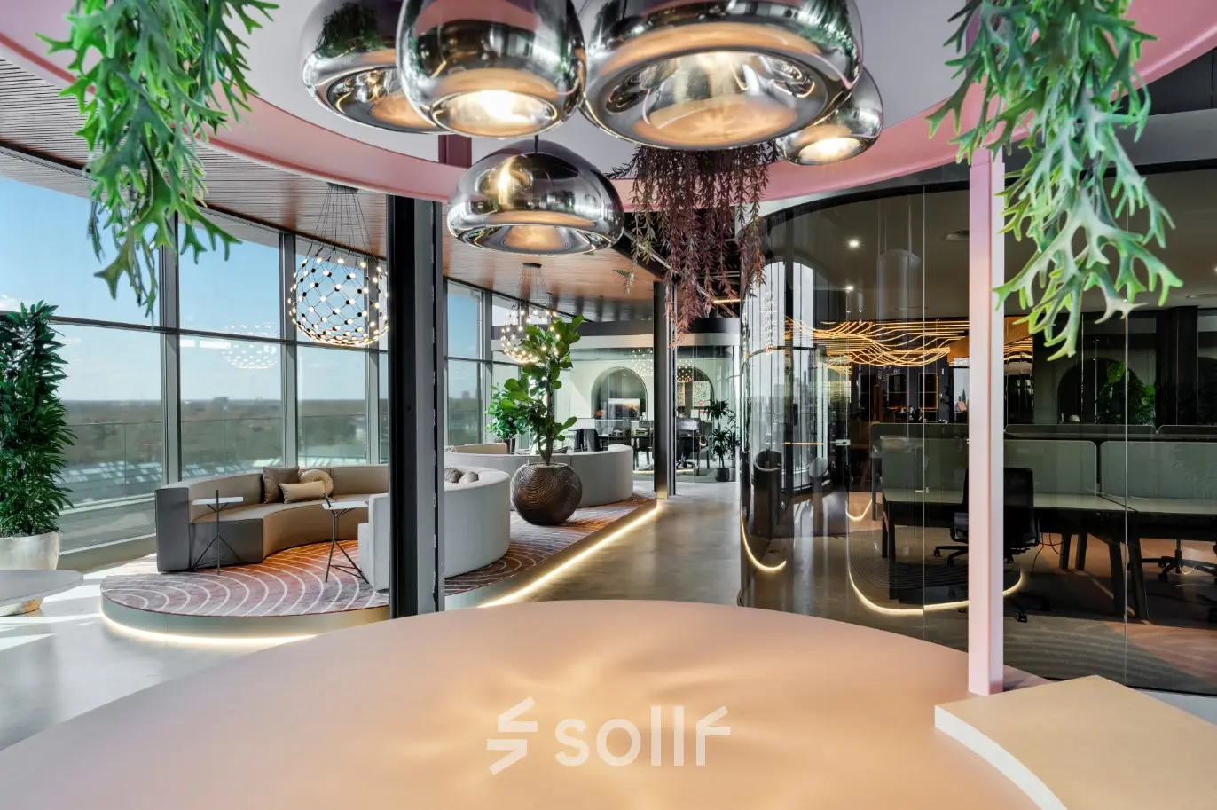 Modern office space for rent in Eindhoven Strijp-S, featuring stylish furniture, large windows, and contemporary lighting. Ideal for businesses seeking a dynamic work environment.