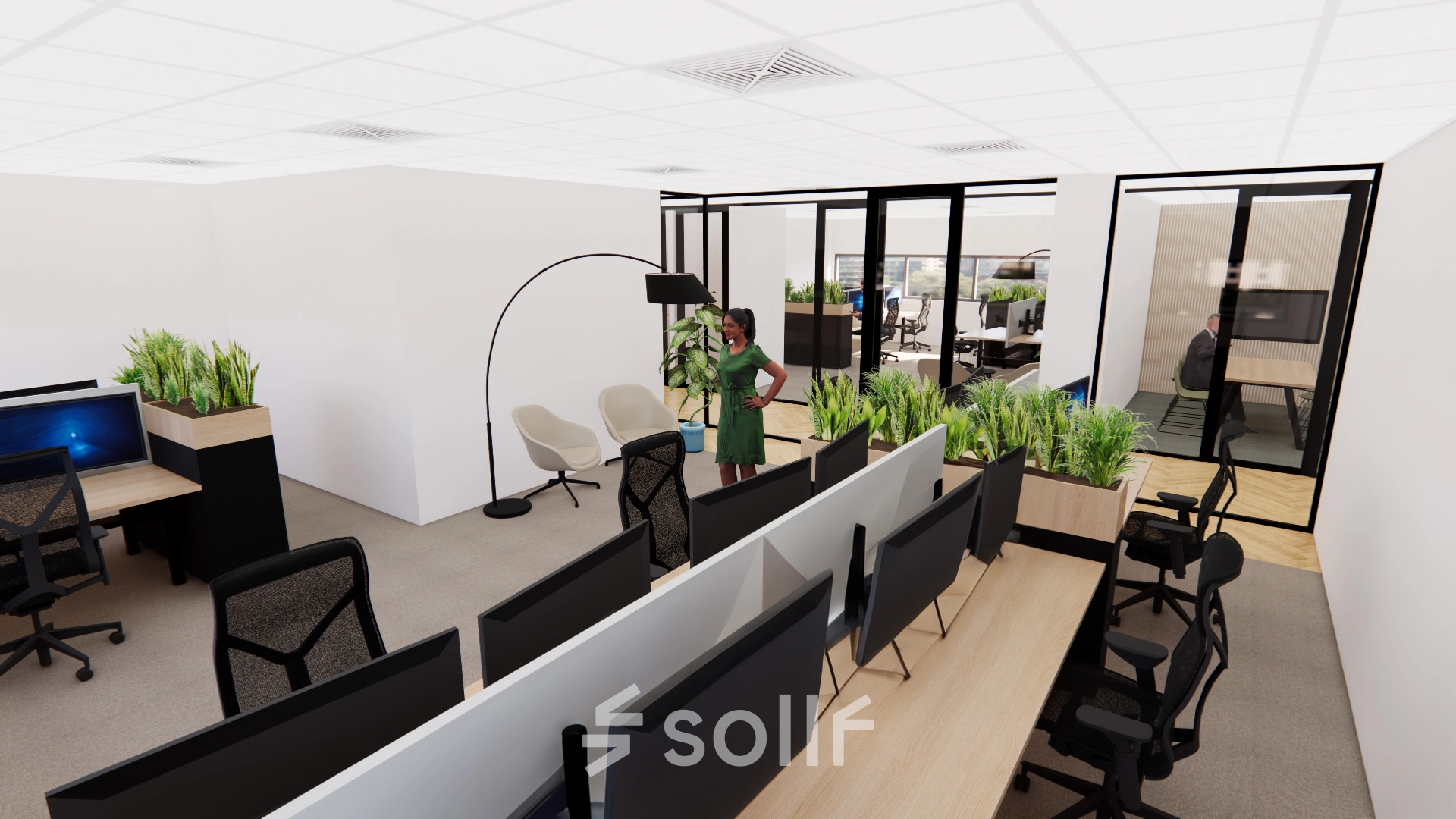 Modern office space with open floor plan at Brandweerstraat 20-30, Enschede, featuring workstations, seating area, and greenery, ideal for office space rental.