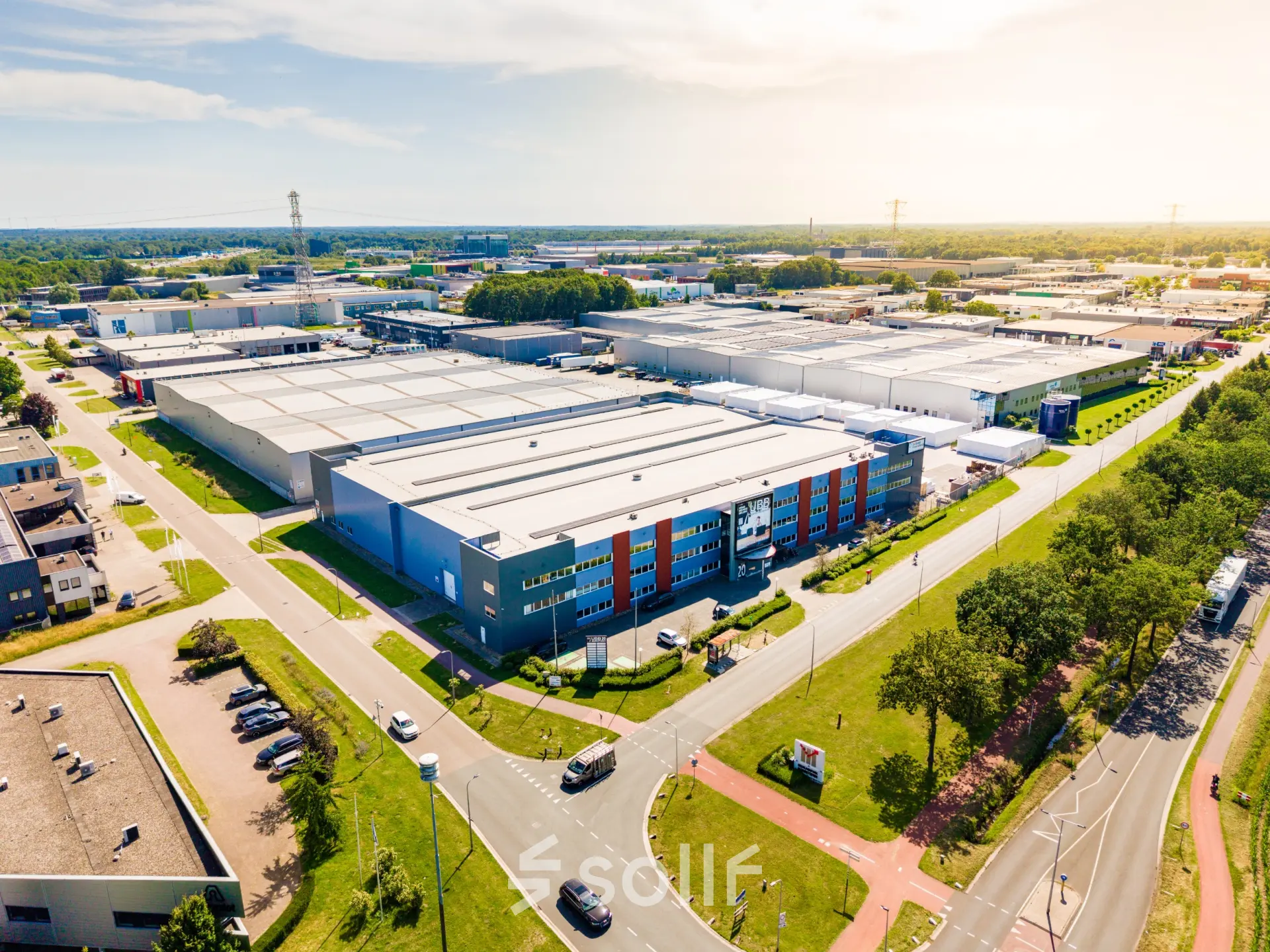 Aerial view of Marssteden 20 in Enschede, showcasing expansive office and industrial spaces available for rent.