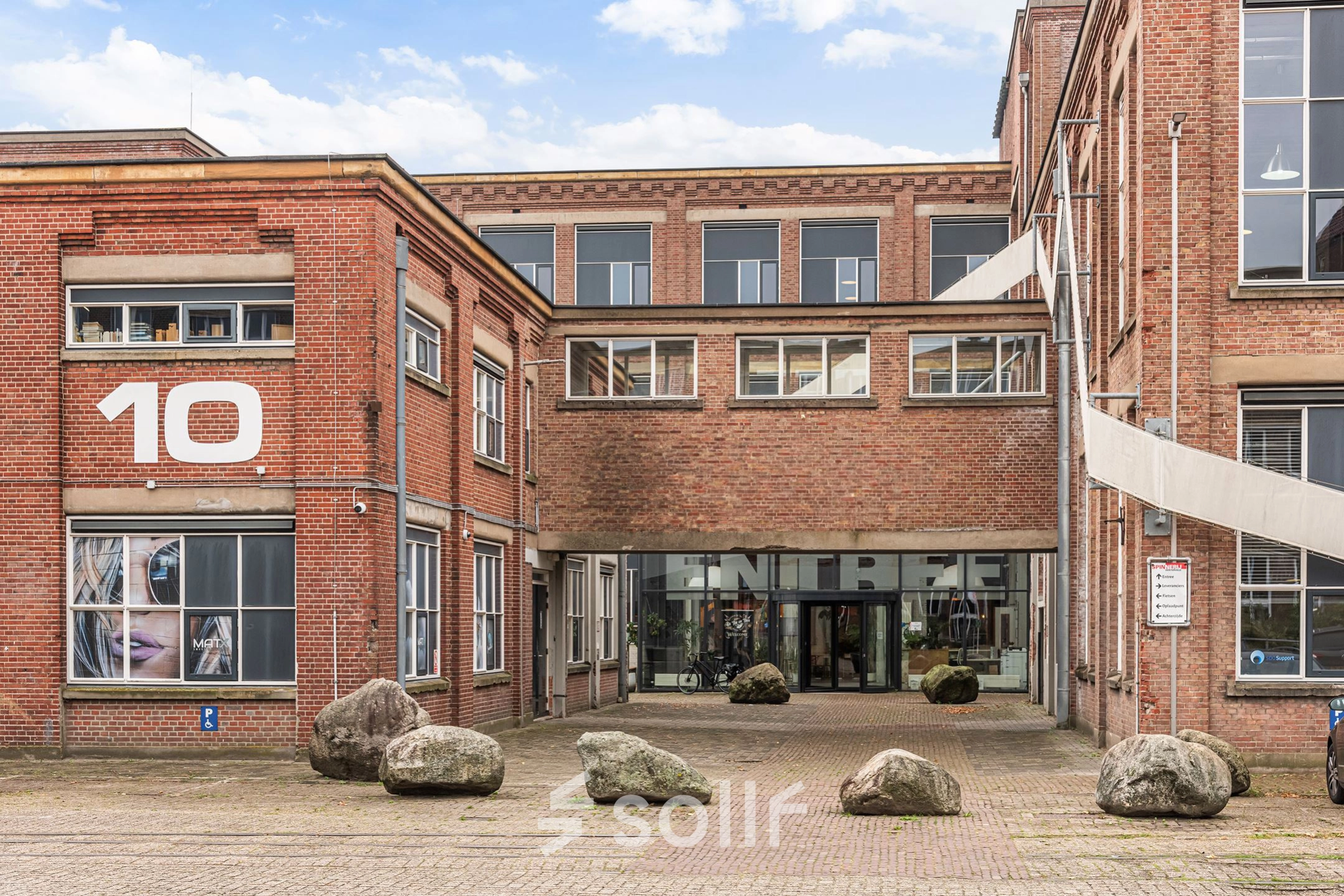 Exterior view of an office building at Rigtersbleek-Zandvoort 10, Enschede, ideal for office space rental.