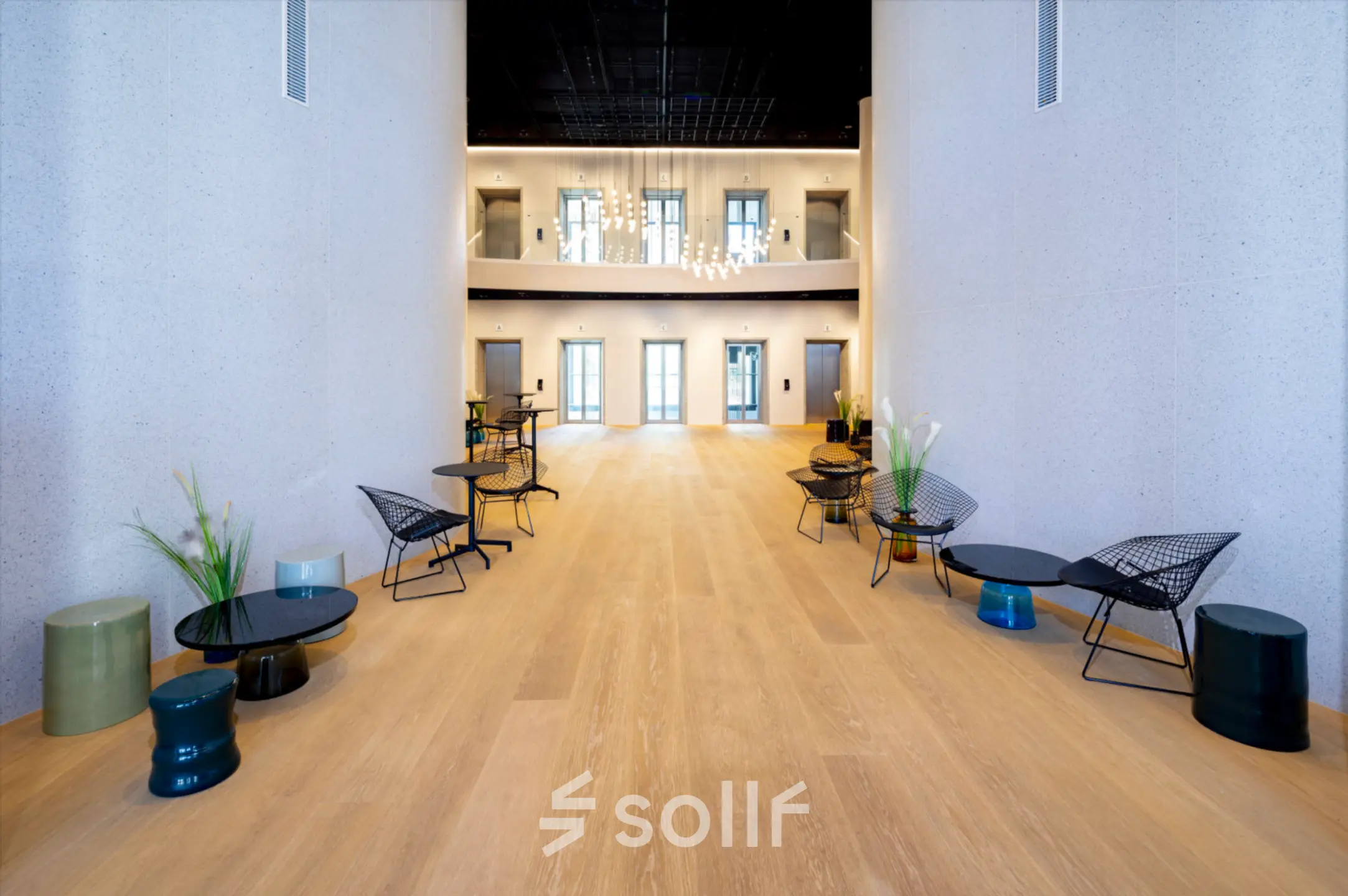 Spacious and modern office space with seating and decor at Solmsstrasse 83, Frankfurt Bockenheim, available for office space rental.