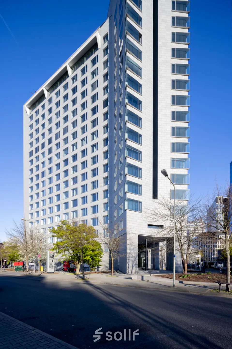 Exterior view of a modern office building at Solmsstrasse 83, located in Frankfurt Bockenheim, suitable for office space rental.