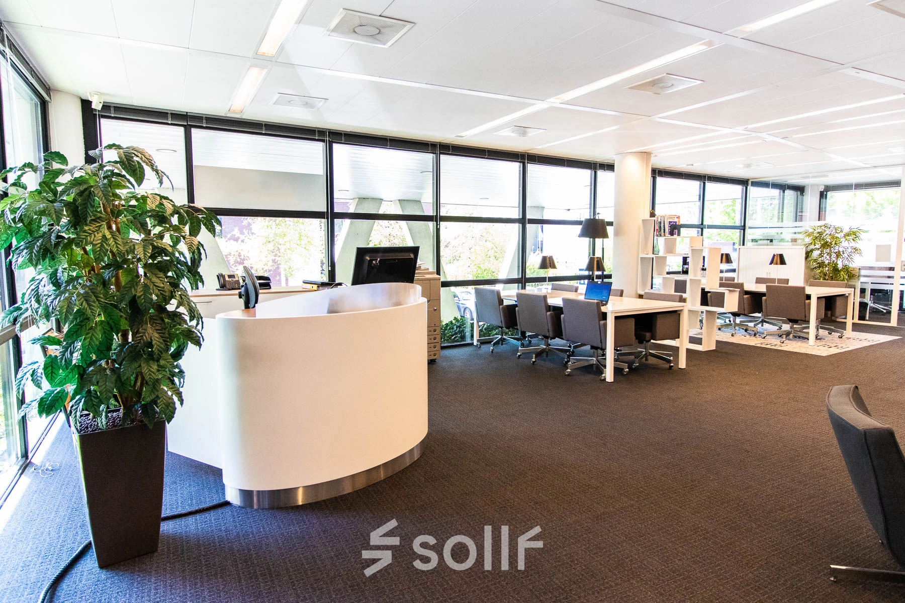 Bright and spacious office interior at Kampenringweg 45, Gouda, featuring modern furnishings and a welcoming atmosphere for office space rental.