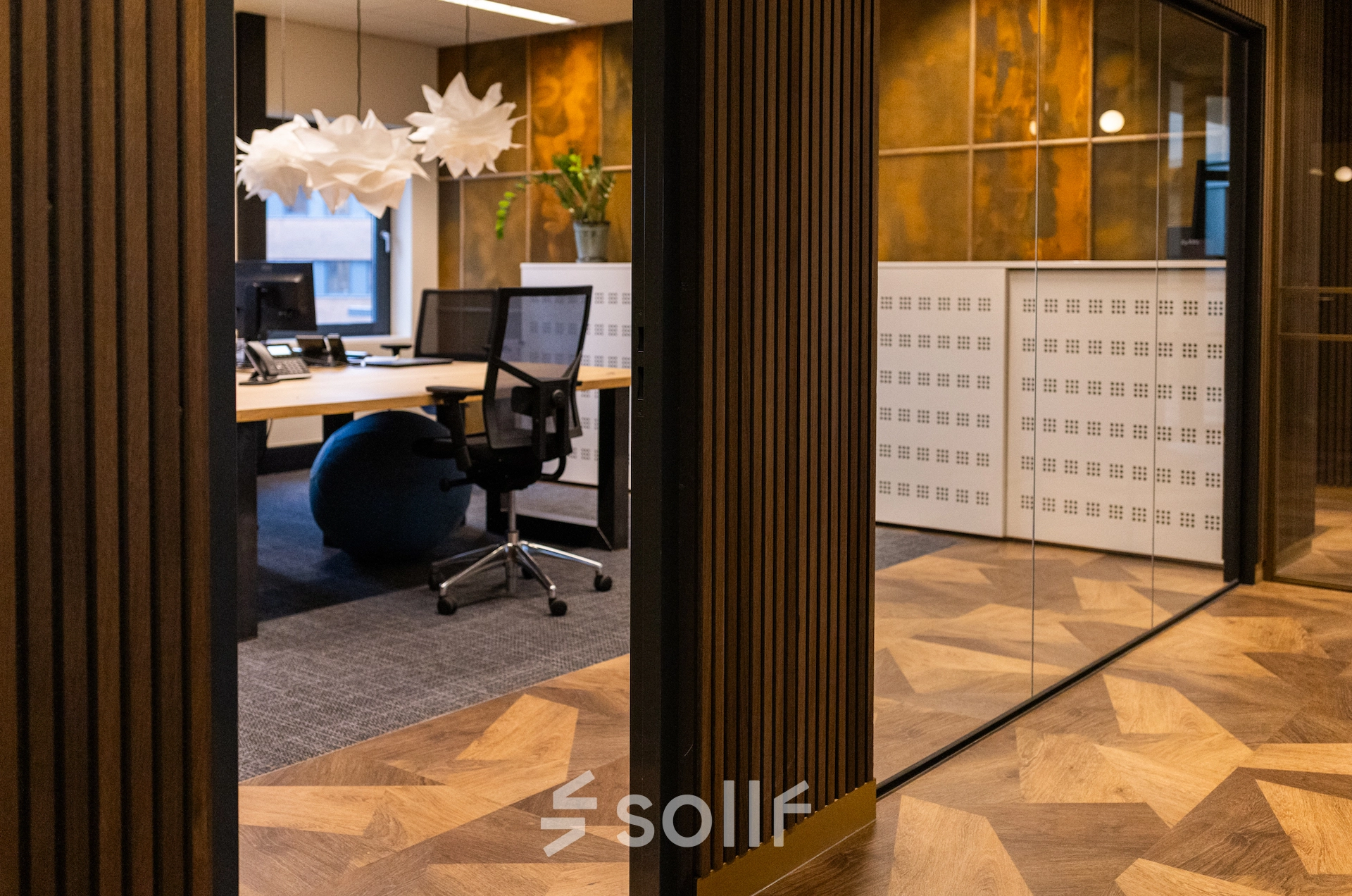 Modern office space at Zuidelijk Halfrond 1, Gouda, featuring stylish furnishings and decorative elements, ideal for those seeking office space rental.