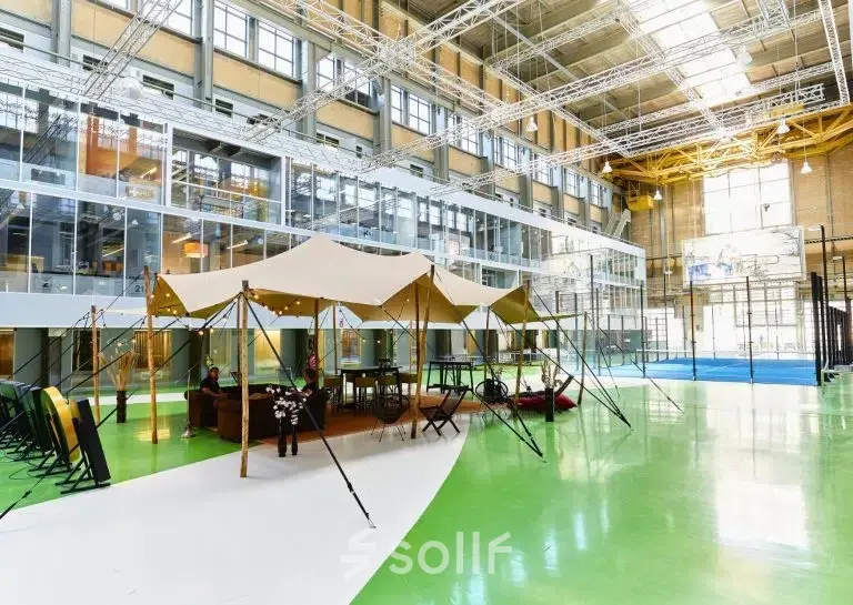 Spacious interior at Helperpark 270-298 in Groningen featuring a unique tented meeting area. Ideal for office space rental.