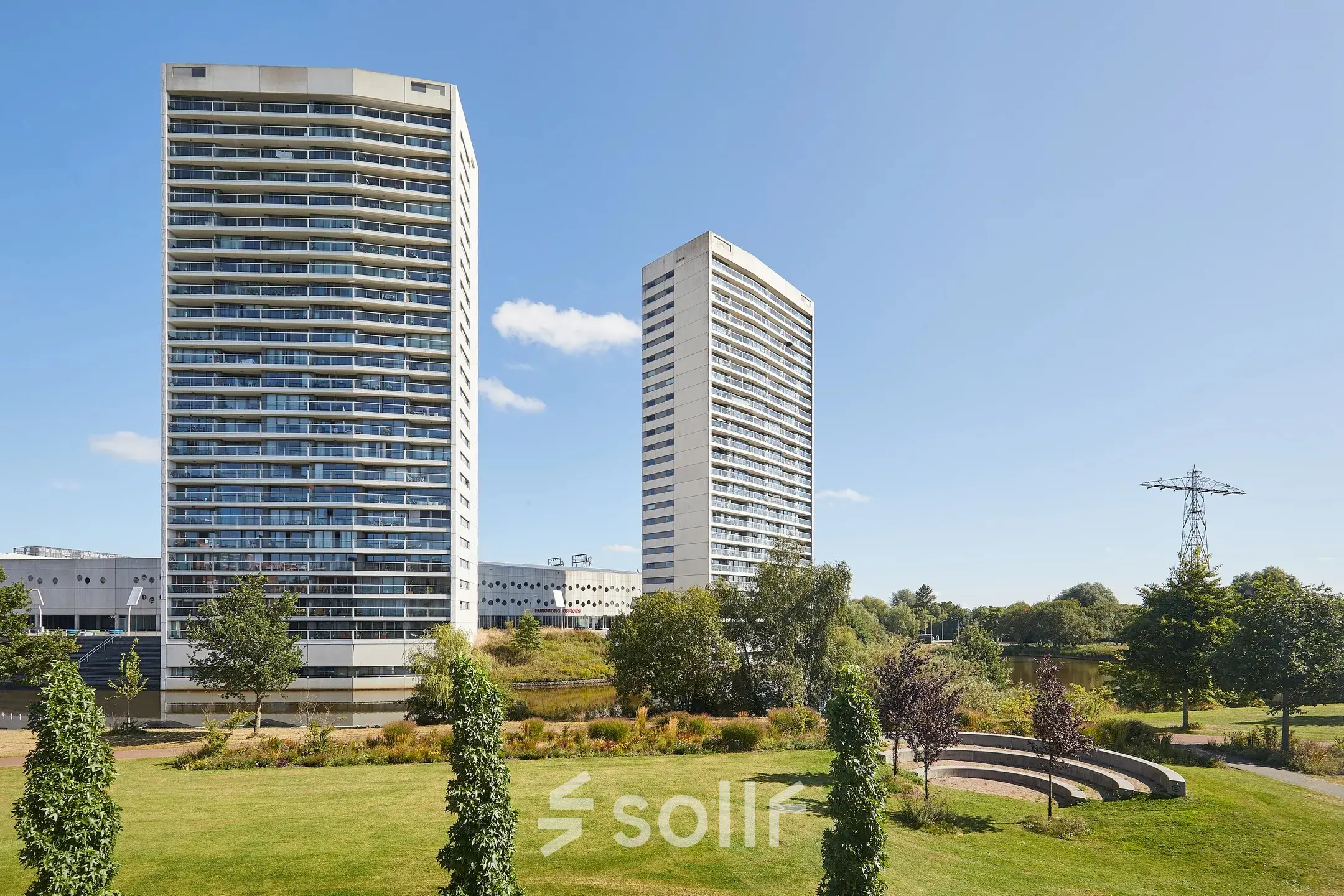 Exterior view of office buildings at Helperpark 270-298 in Groningen, ideal for office space rental with surrounding greenery.