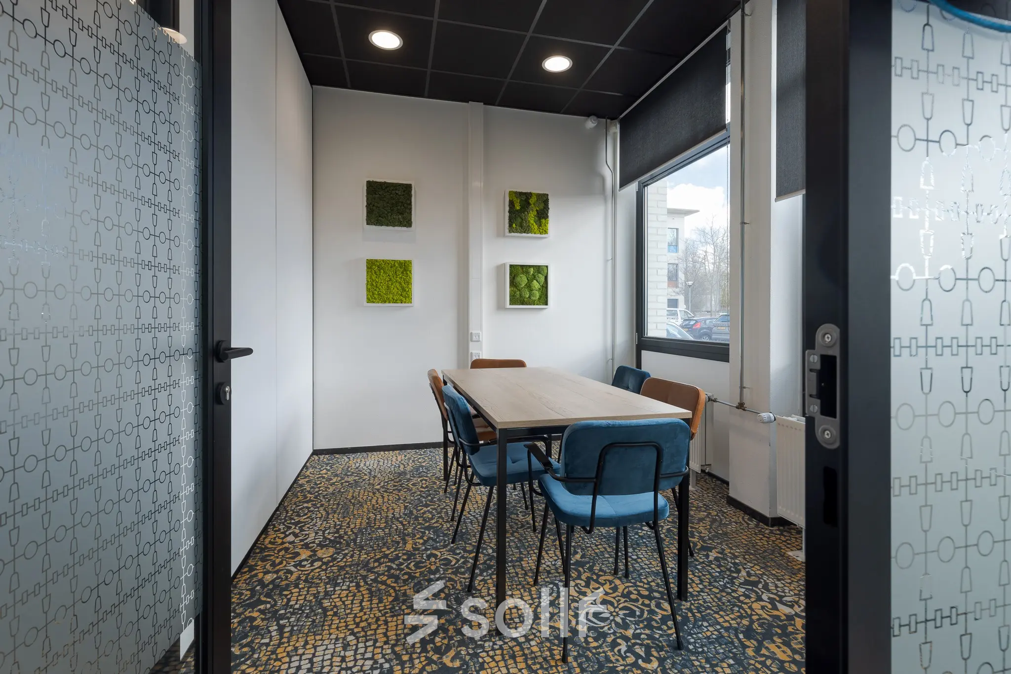 Modern office space in Groningen with stylish furnishings and an artistic touch. Ideal for office space rental.