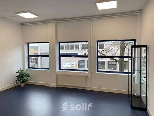 Bright office space rental at Nijverheidsweg 50, Haarlem Oost, featuring large windows and a sleek interior design.